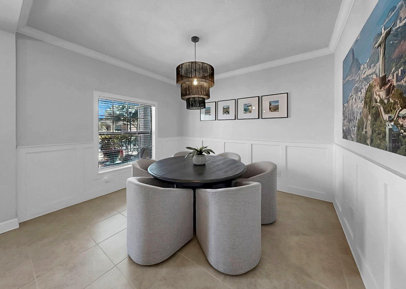 Dining room with updated lighting fixture