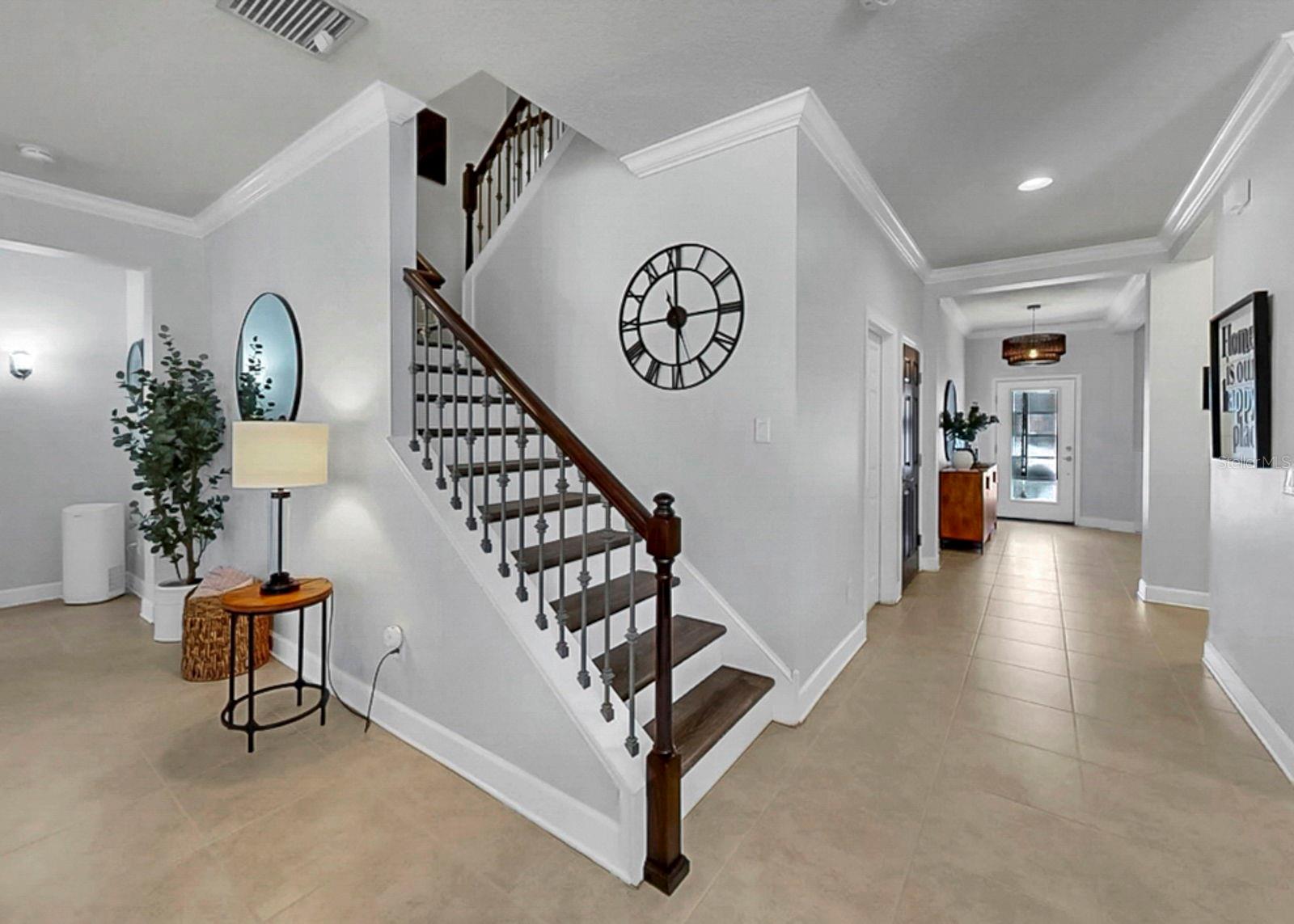 Crown molding lines the downstairs living spaces