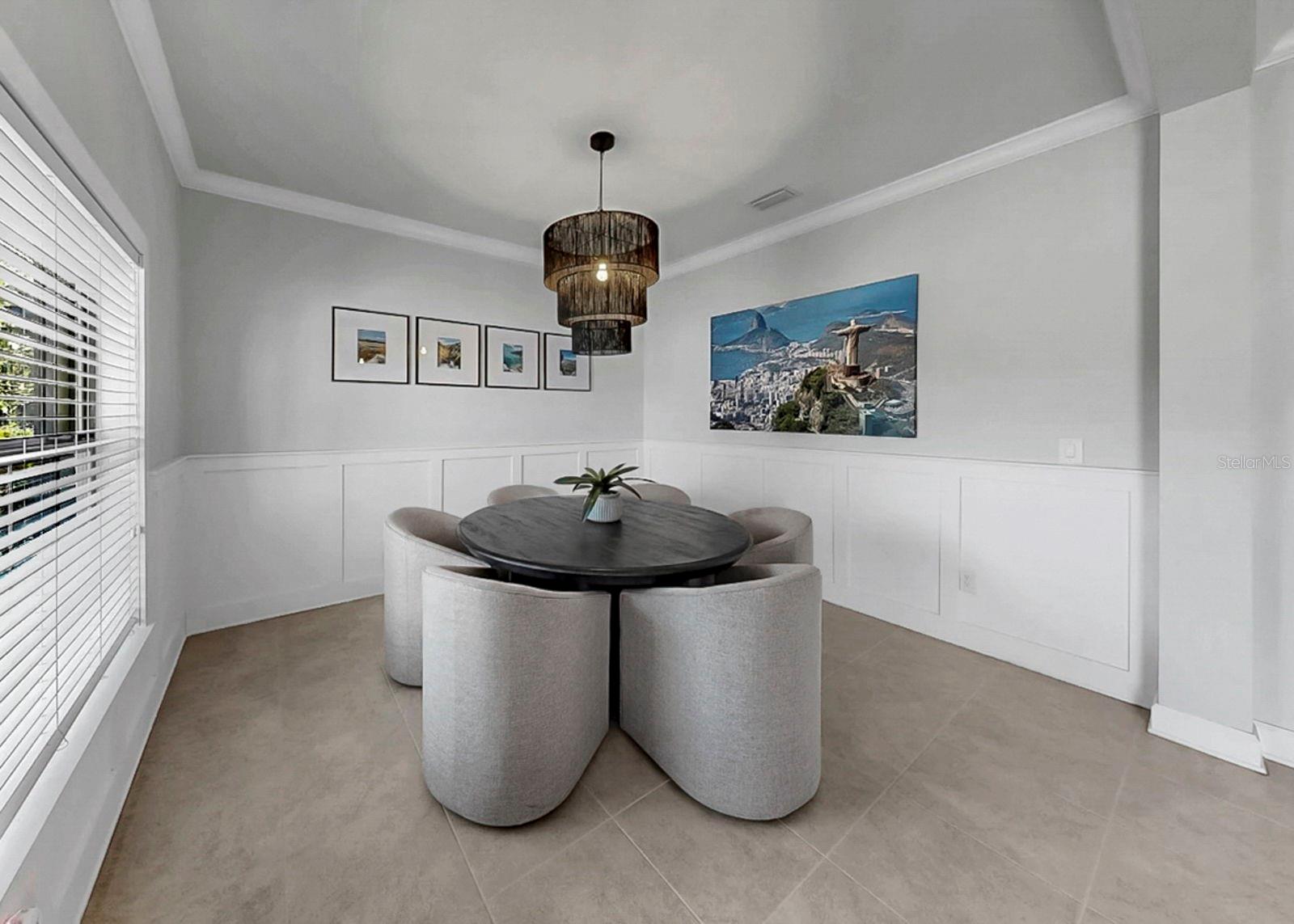 Dining room with board and batten - could also be transformed into an office or downstairs bedroom