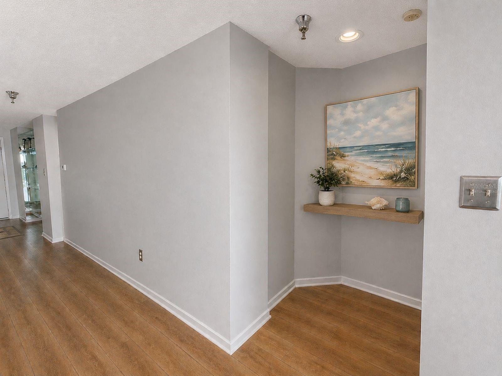 *Virtually Staged* to show the possibilities of the home if you removed the wallpaper and mirrors!