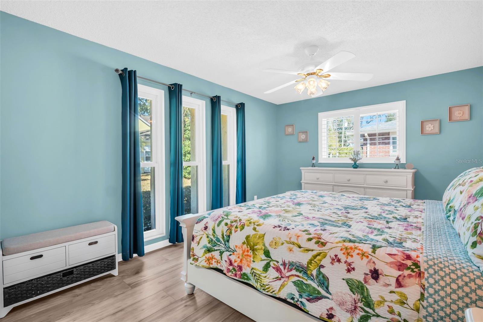 Spacious primary suite, large hurricane-impact windows~