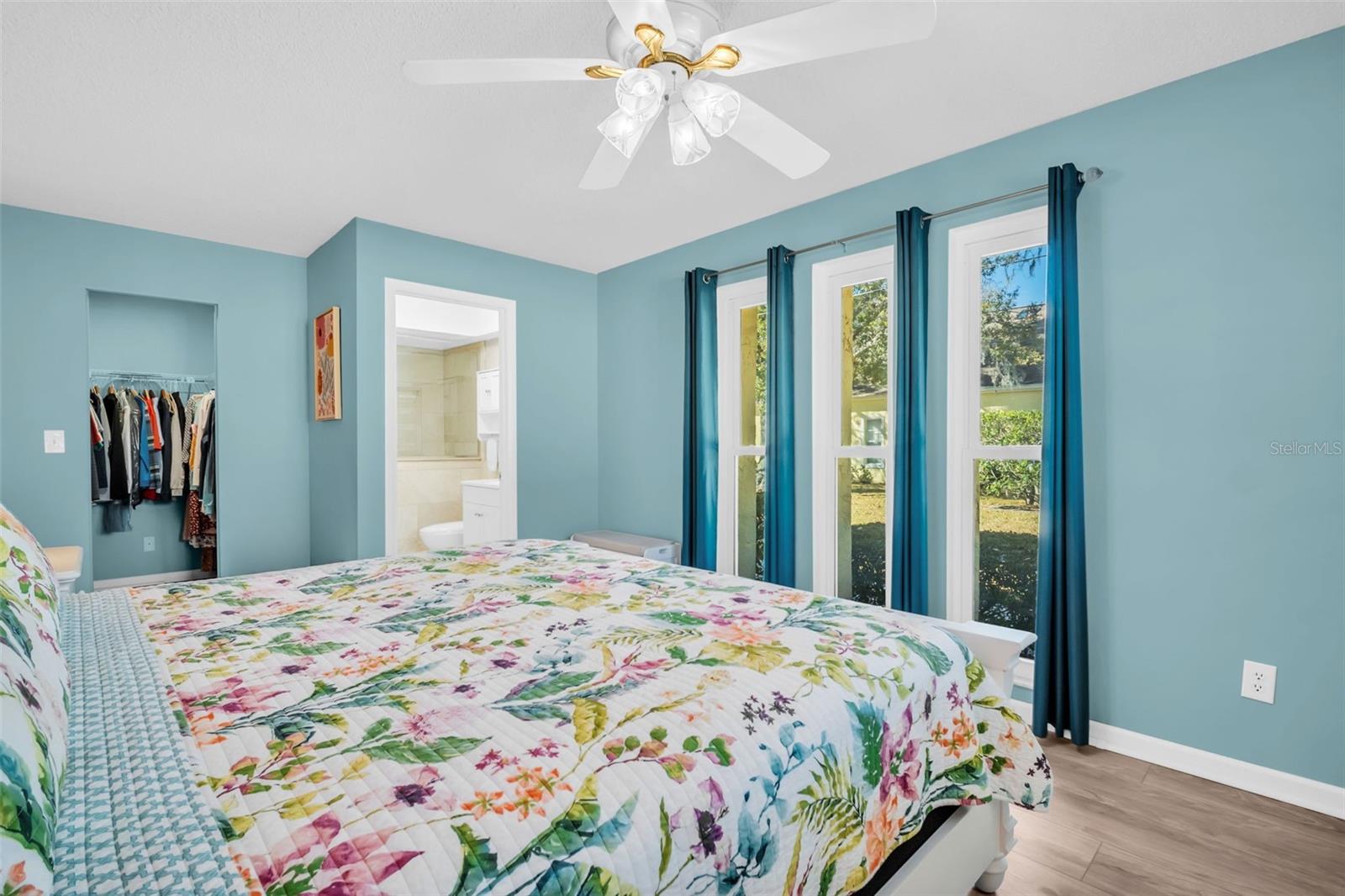 Primary oasis offers a large walk-in closet and fully updated en-suite bath~