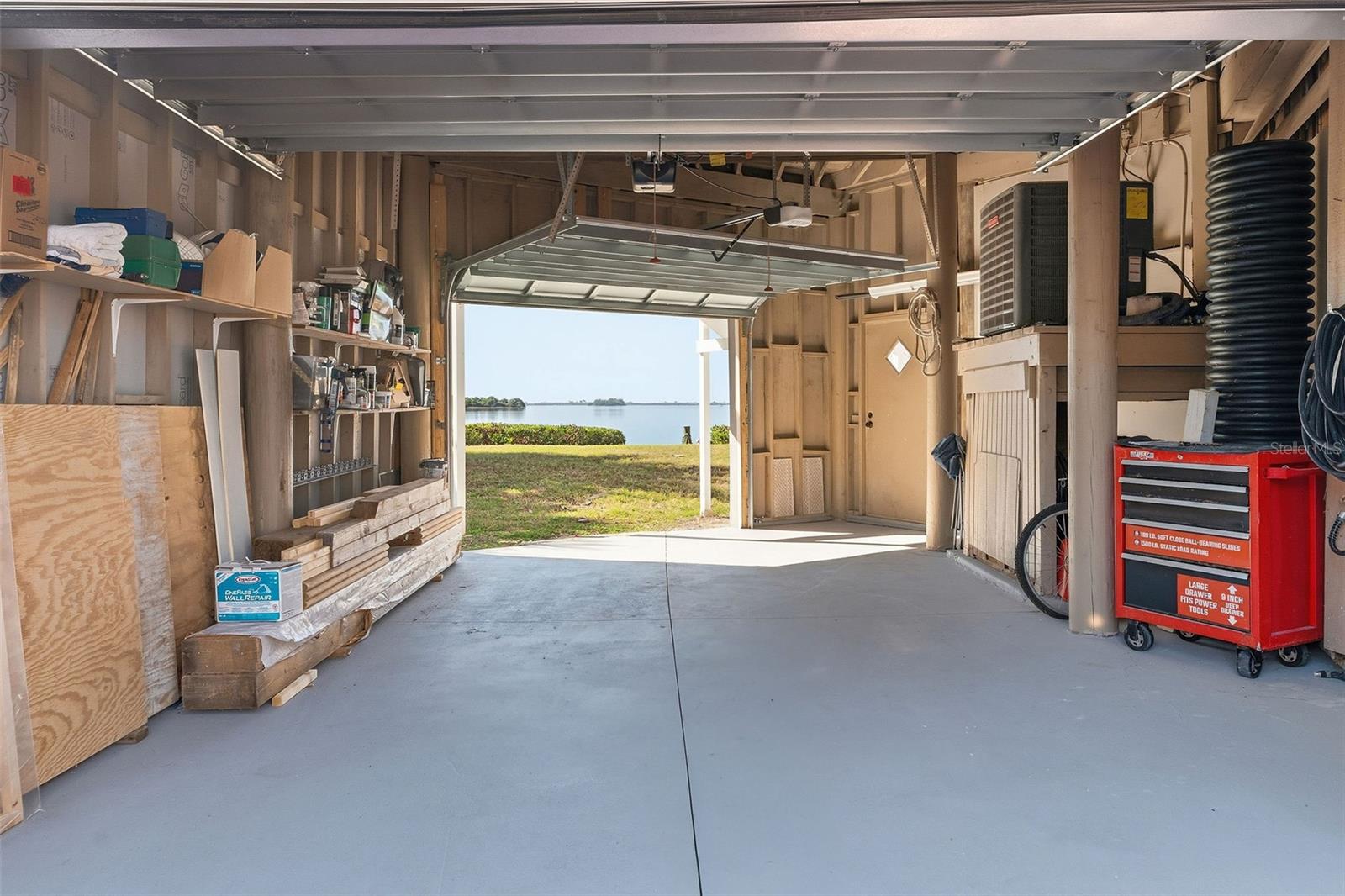 One car garage with rear garage door open
