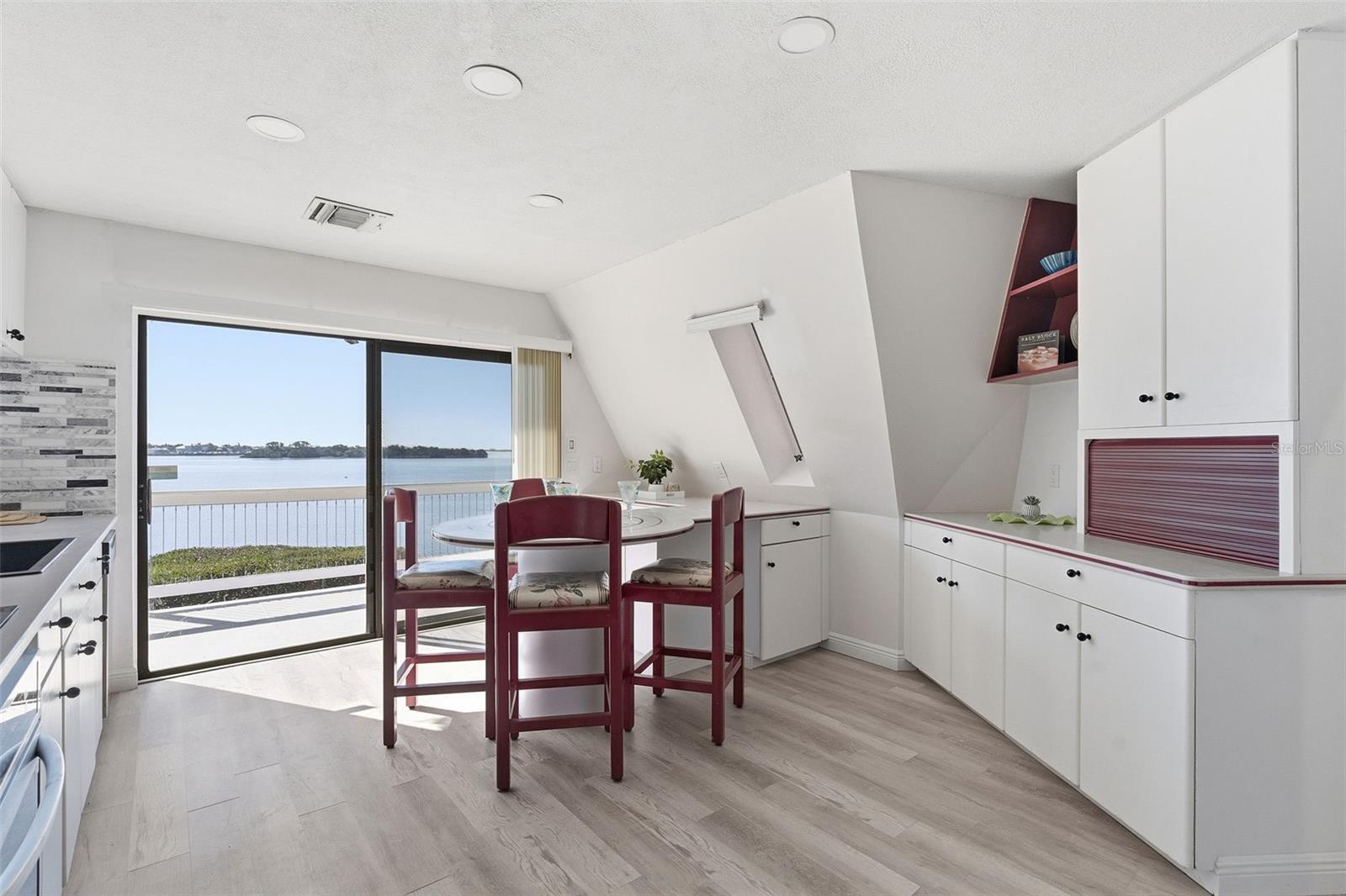 kitchen with sliding glass door facing Ozona Marina and Dunedin Causeway.