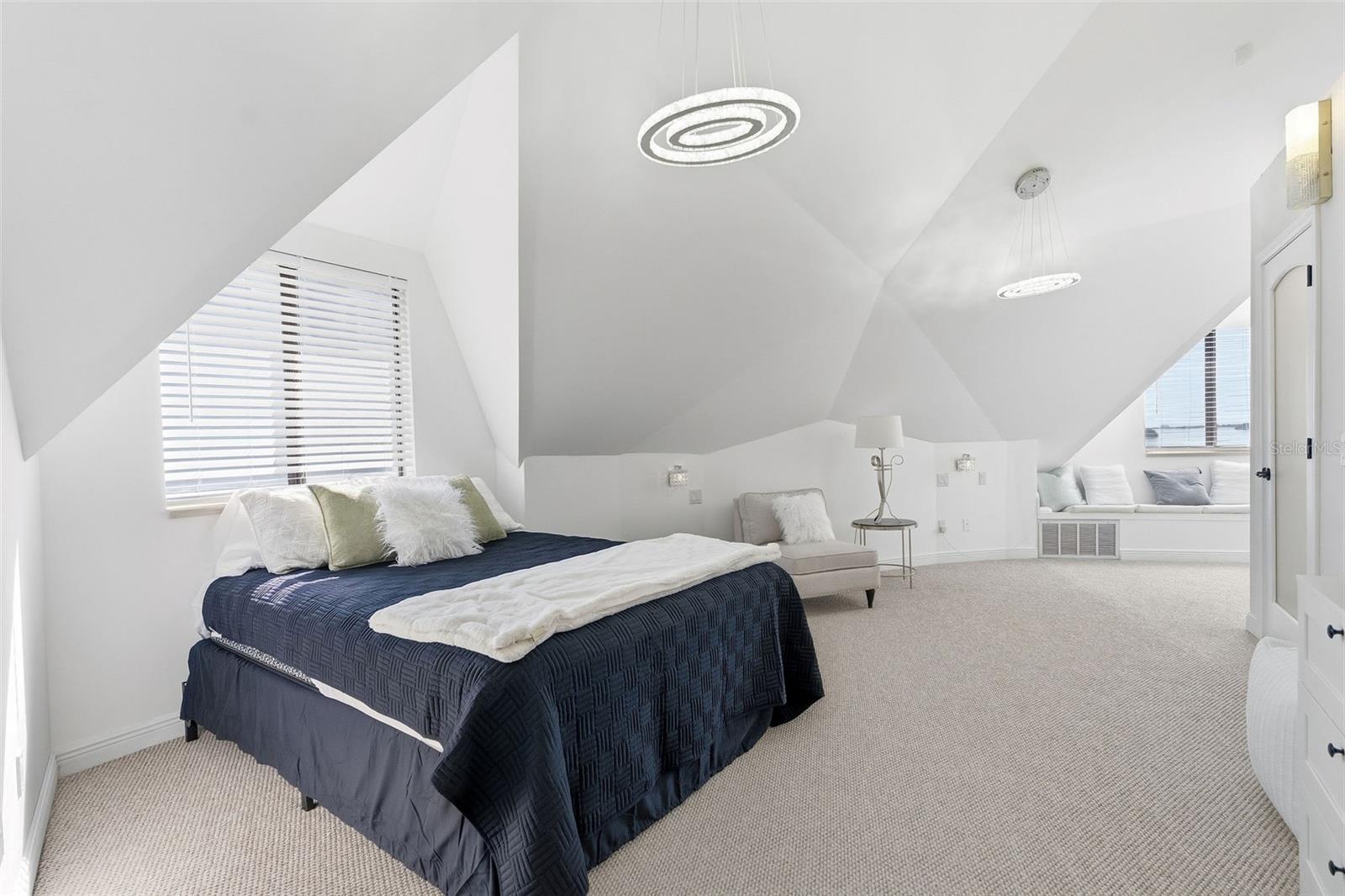 Primary bedroom and sitting area