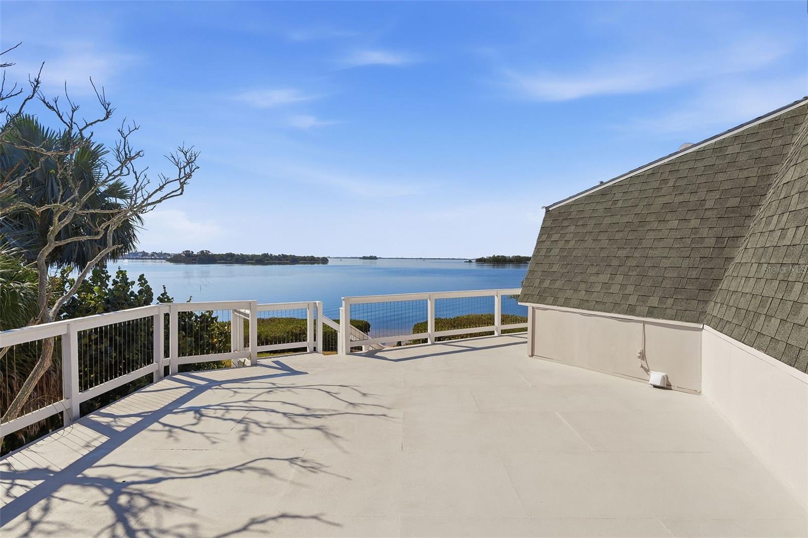 First floor deck off kitchen with rear yard access.