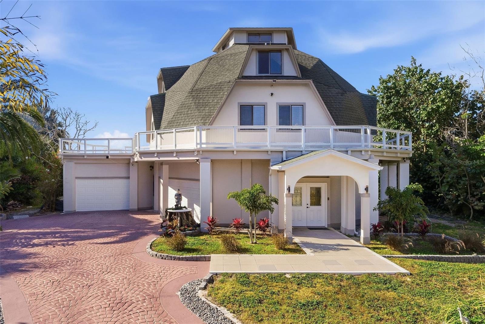 front view with 2 garage entries