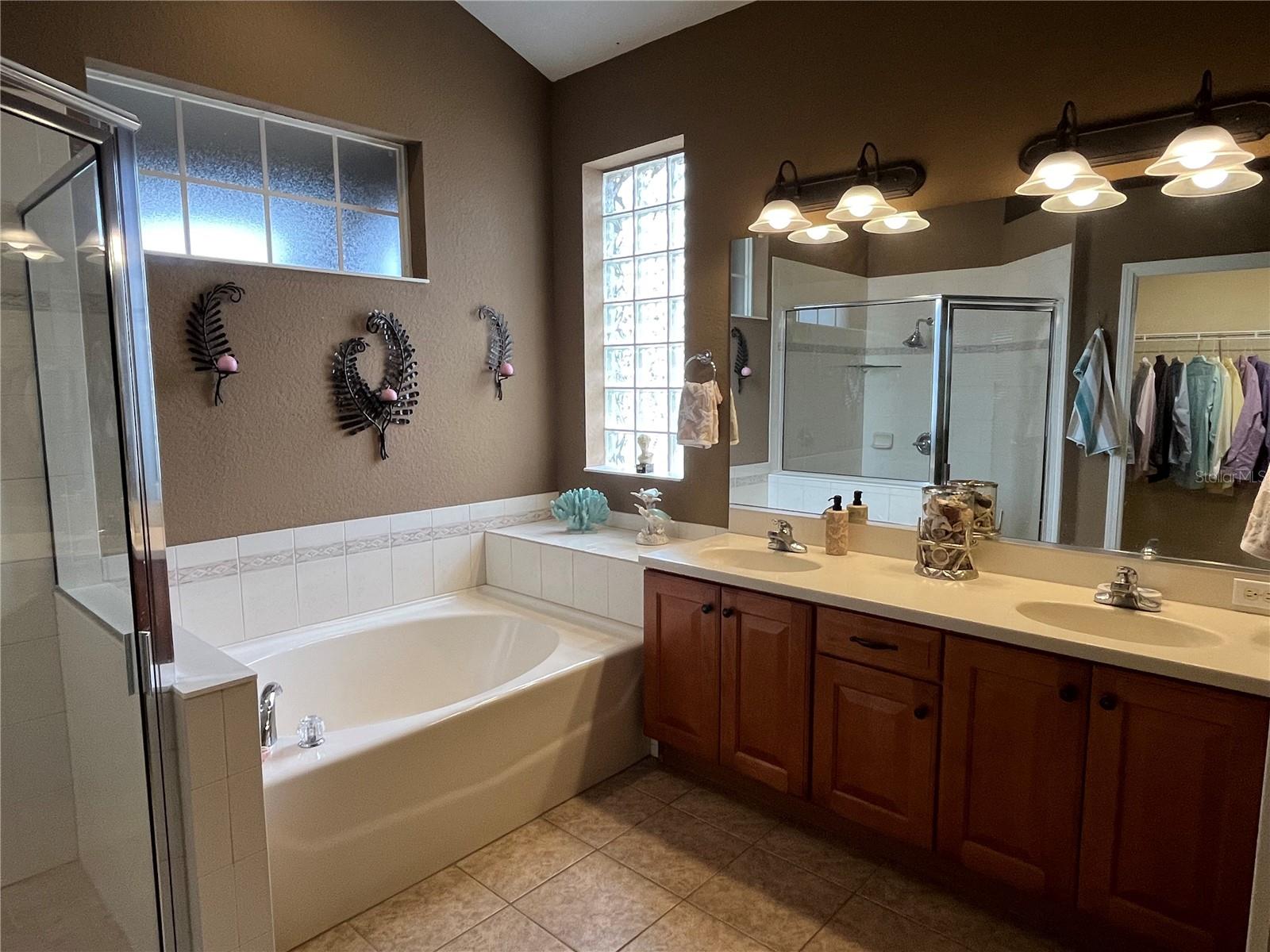 SOAKING TUB, SOLID SURFACE COUNTERS AND DUAL SINKS
