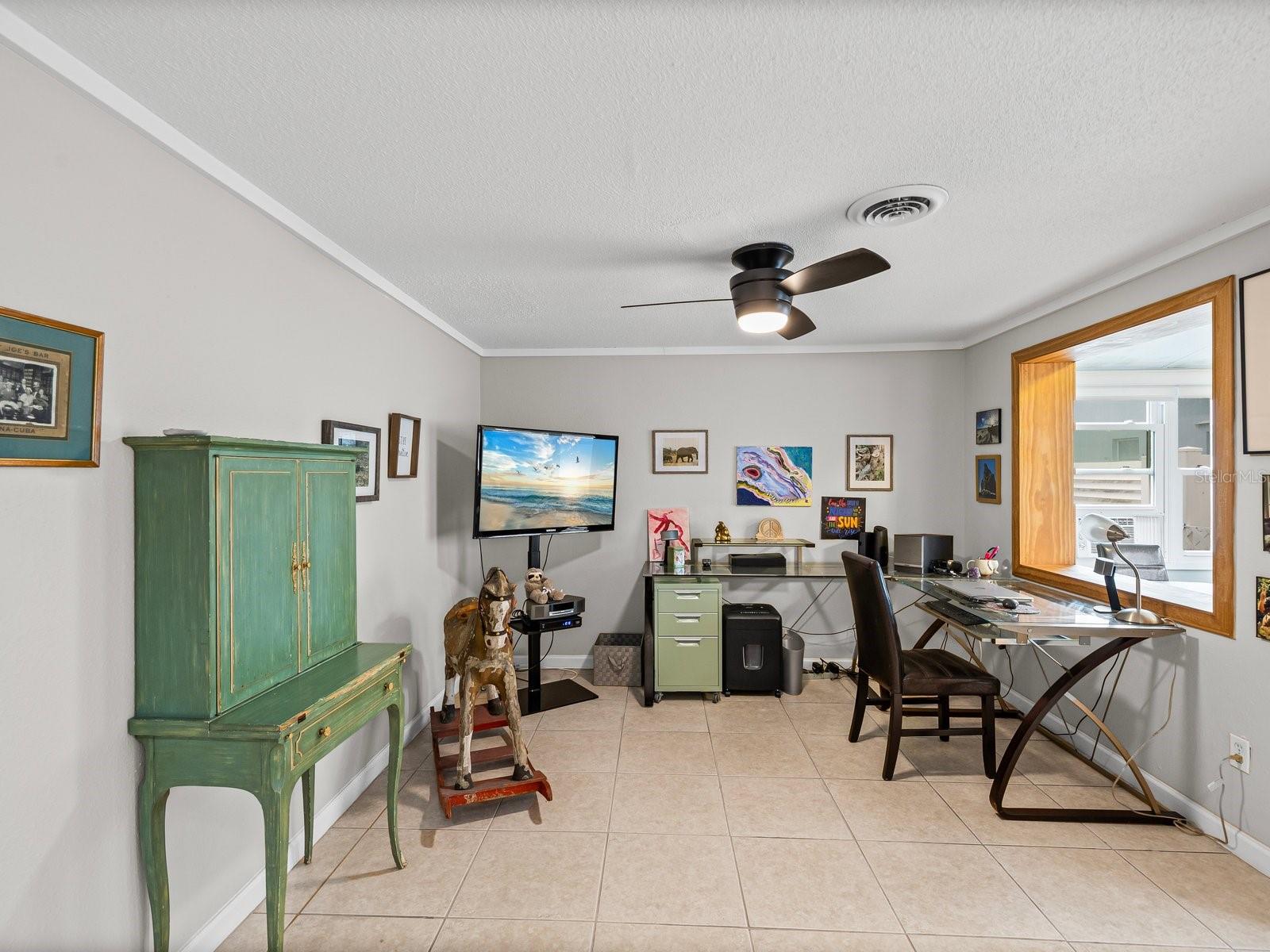Dining space off kitchen used as office