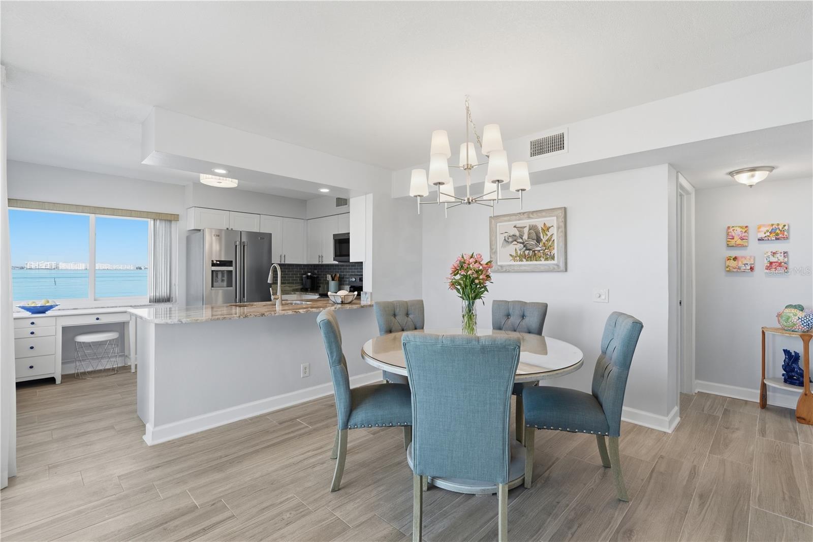 Enjoy tranquil water views from the spacious Dining Room and Kitchen.