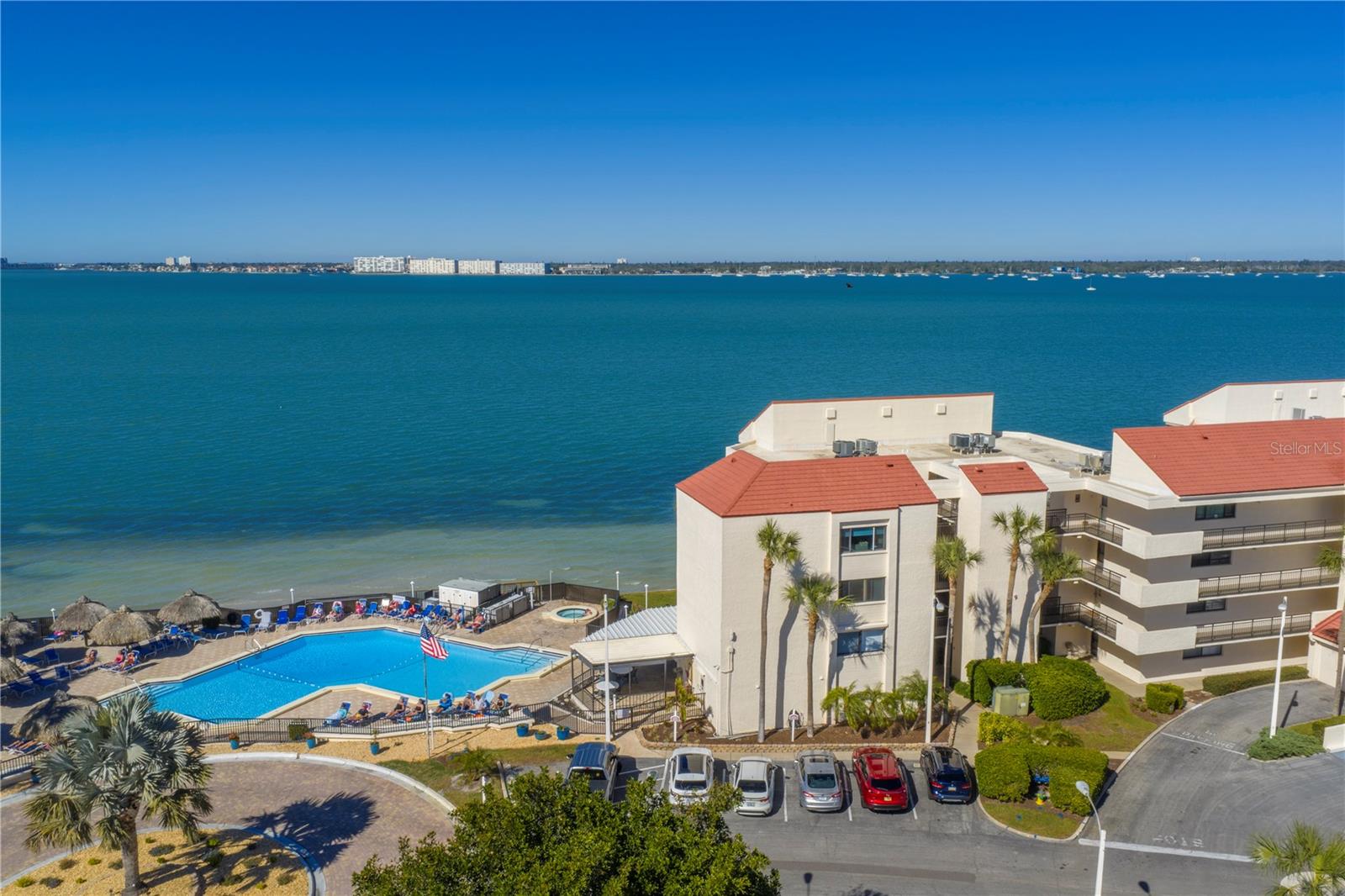 Enjoy lounging with friends and neighbors at the La Puerta community pool area. The large patio features tiki huts, a spa and 2 gas grills. The community room is located just off the pool area.