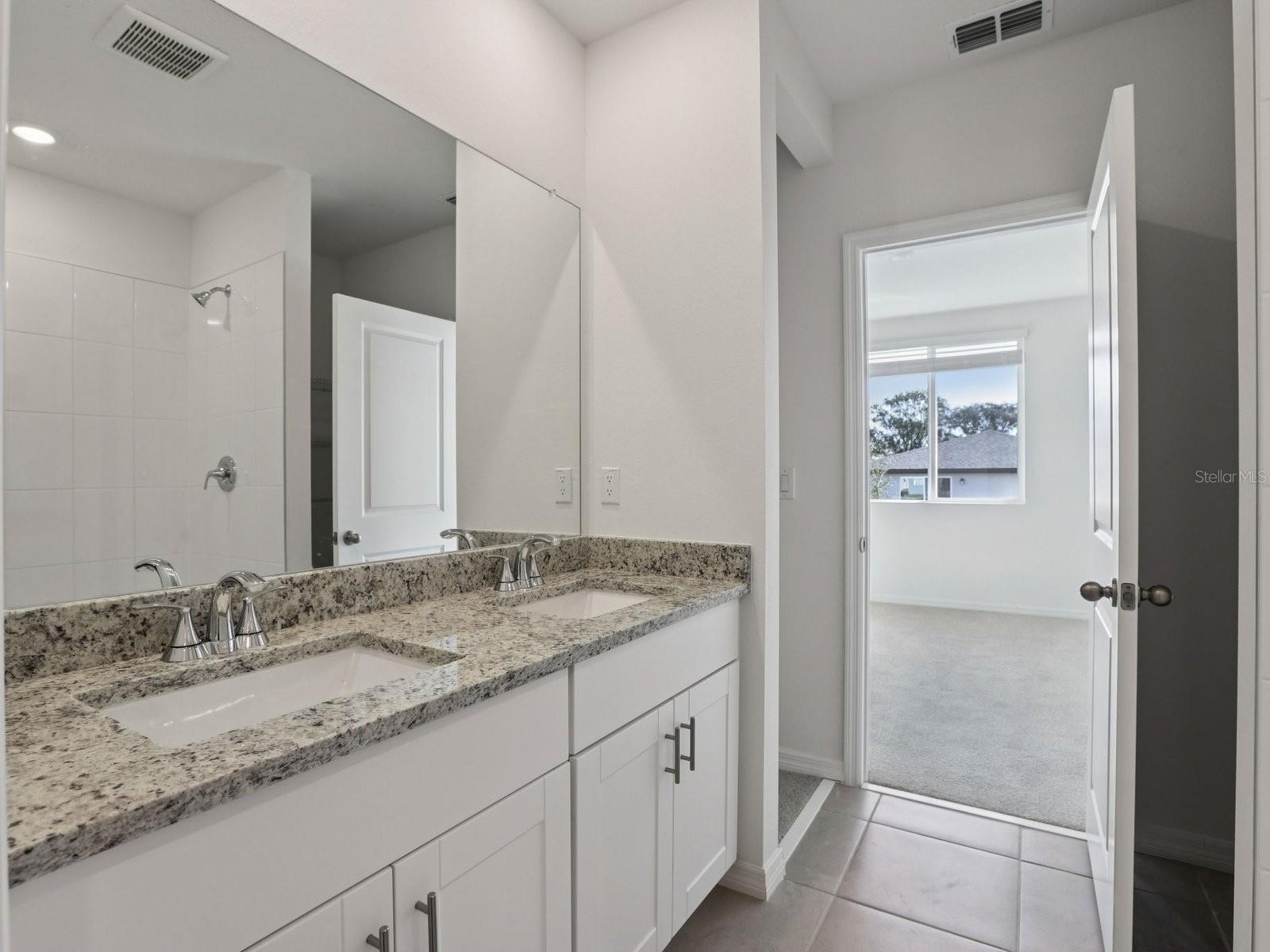 Interior photos are not of the actual home but are photos of the builder home with the same floorplan with similar interior finishes and features.