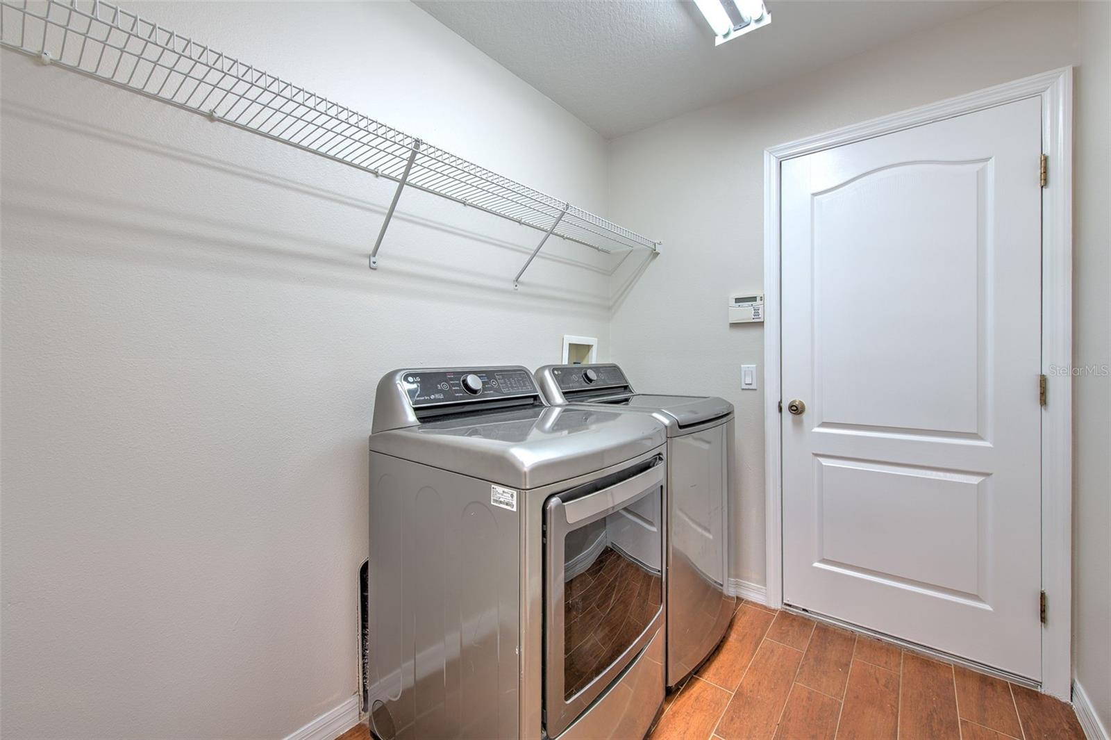 Very roomy laundry room with easy access to garage!