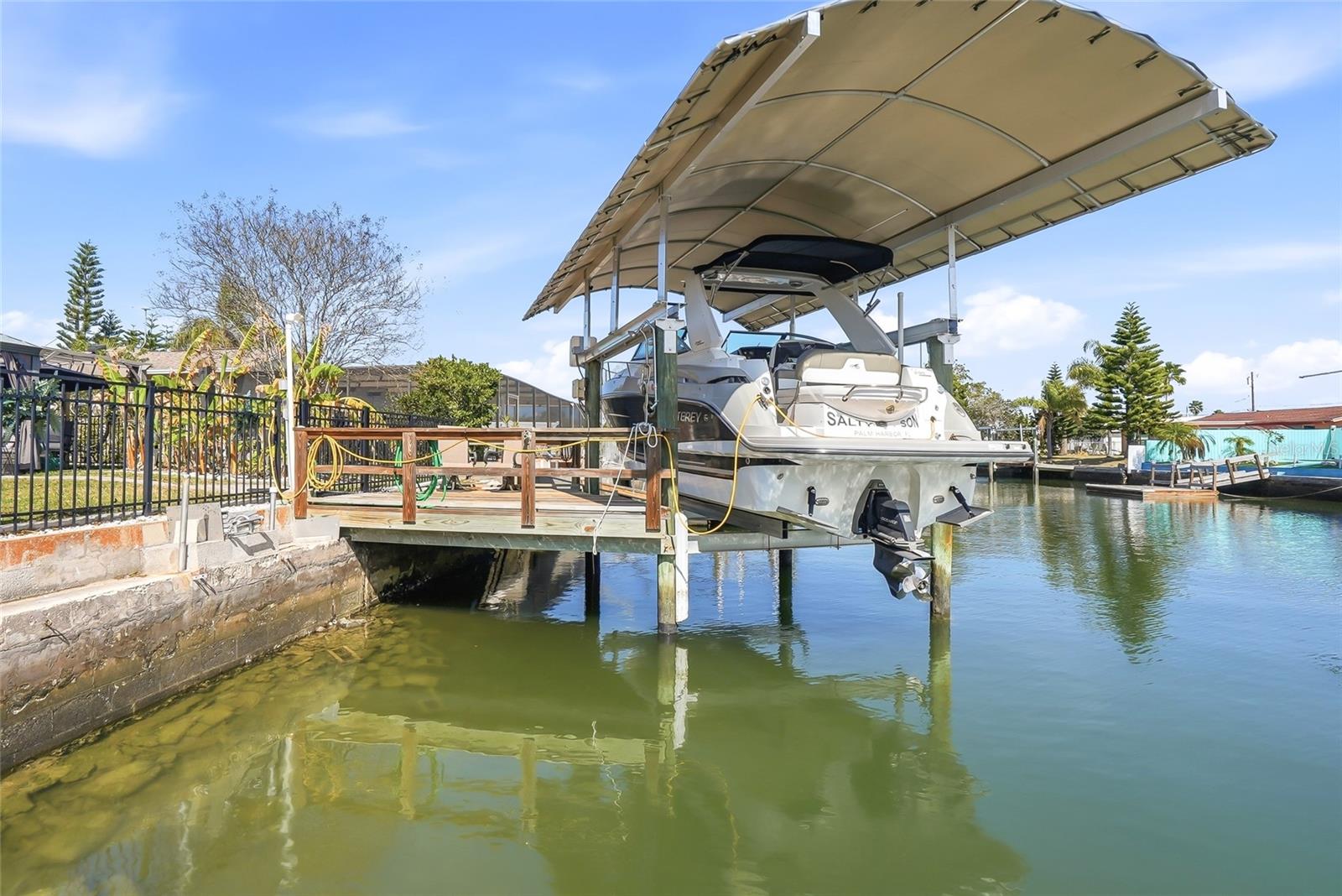 dock with lift & cover. 13,500 weight capacity