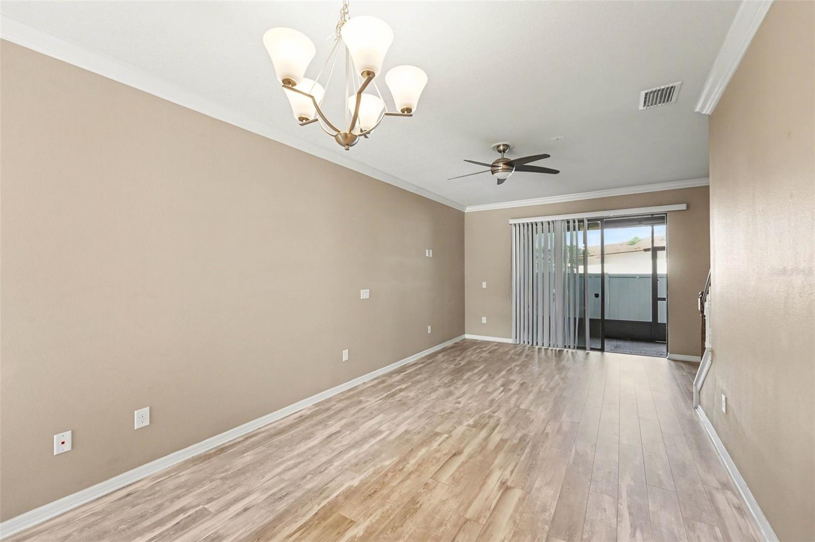 Open Floorplan: The main level features a bright, open-concept living area designed for easy entertaining and a modern lifestyle.