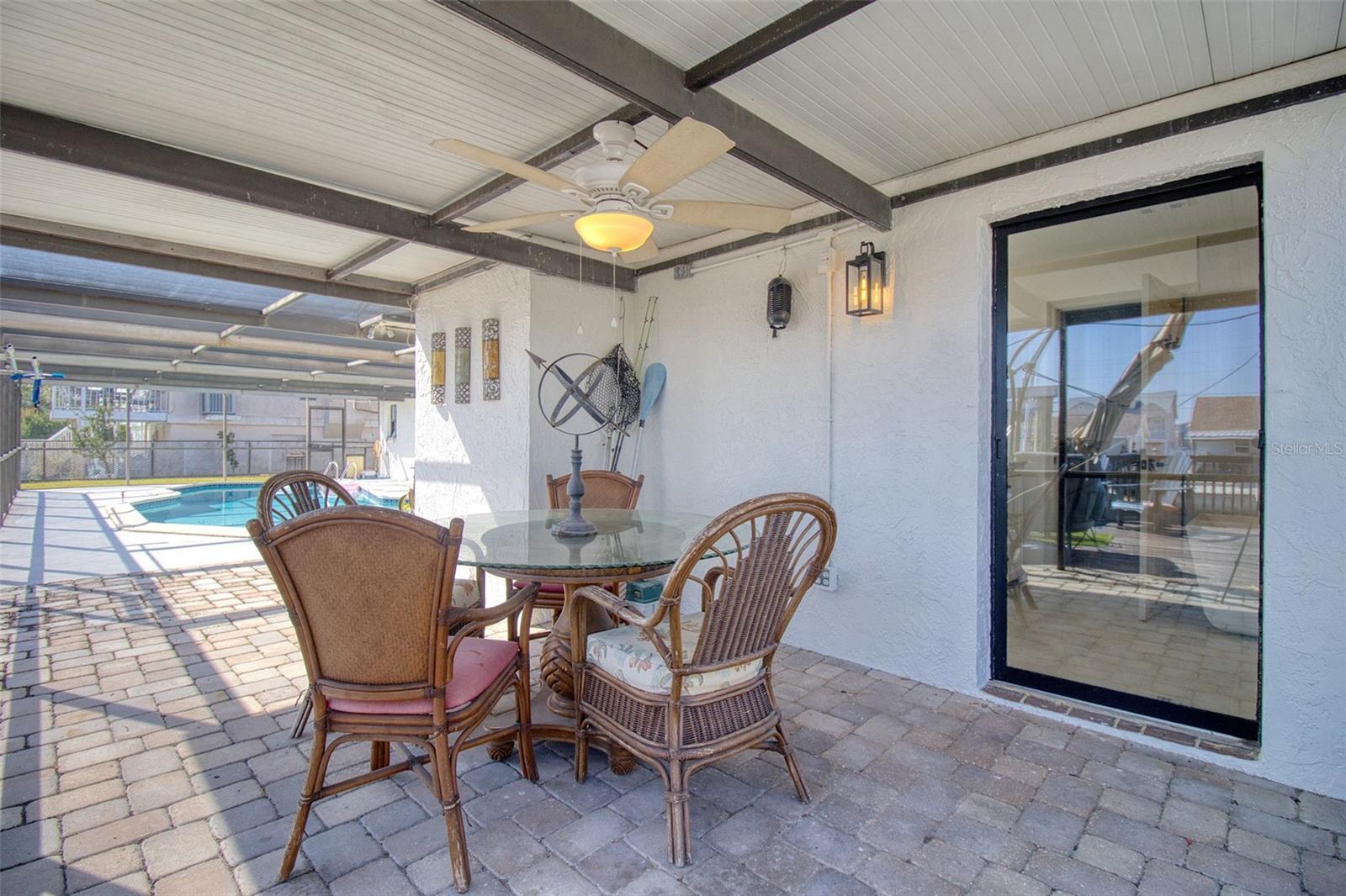 Covered patio off primary bathroom