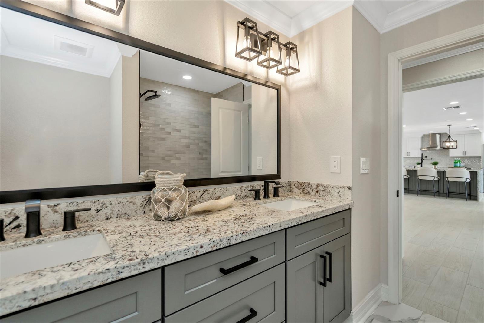 Natural stone countertops and spacious cabinet