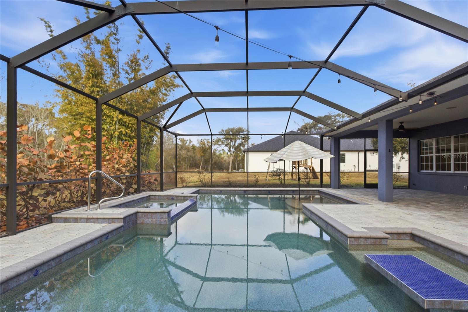 Salt Water Pool with Spa and swim up bar table