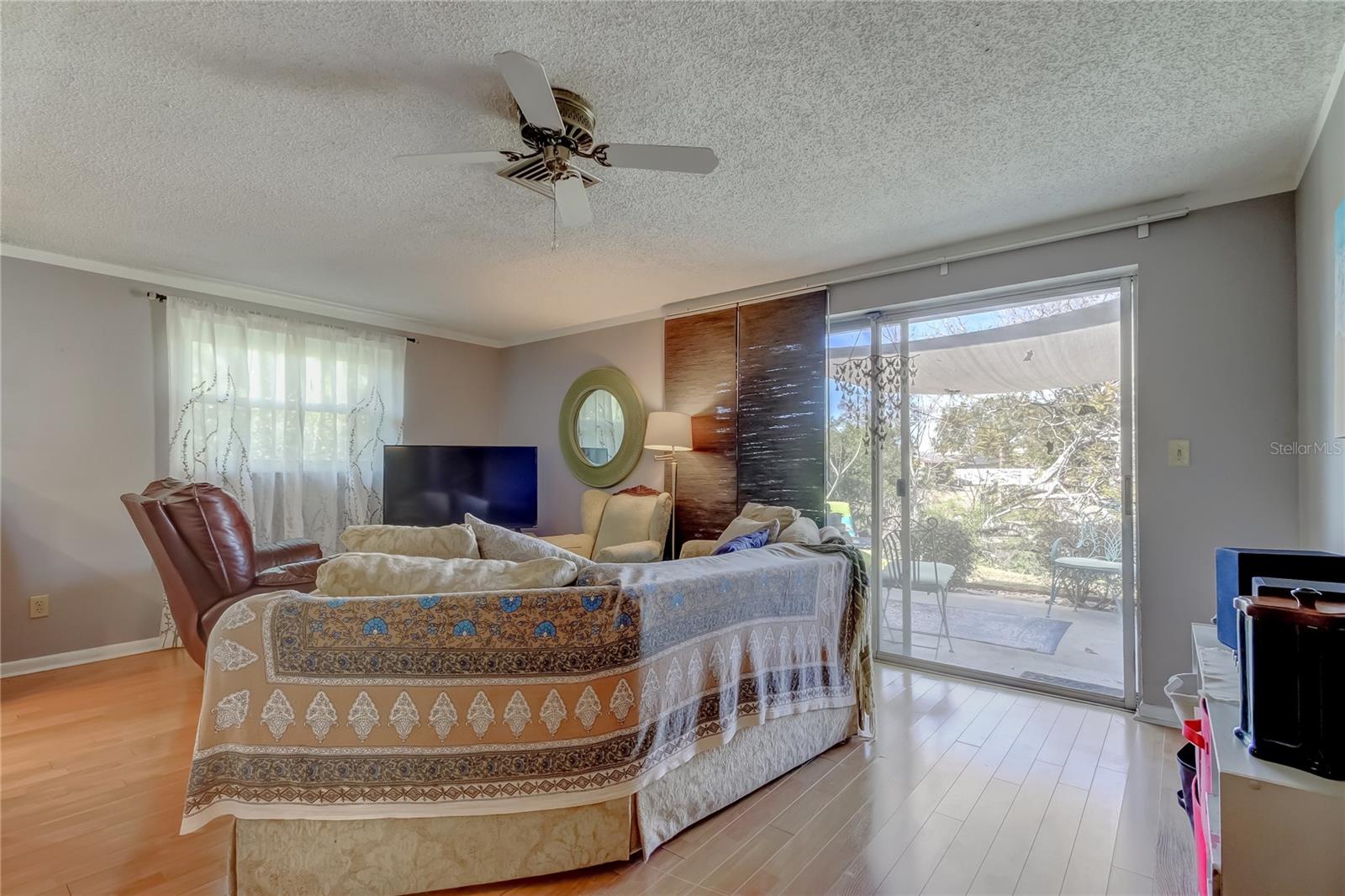 family room with sliders to back patio