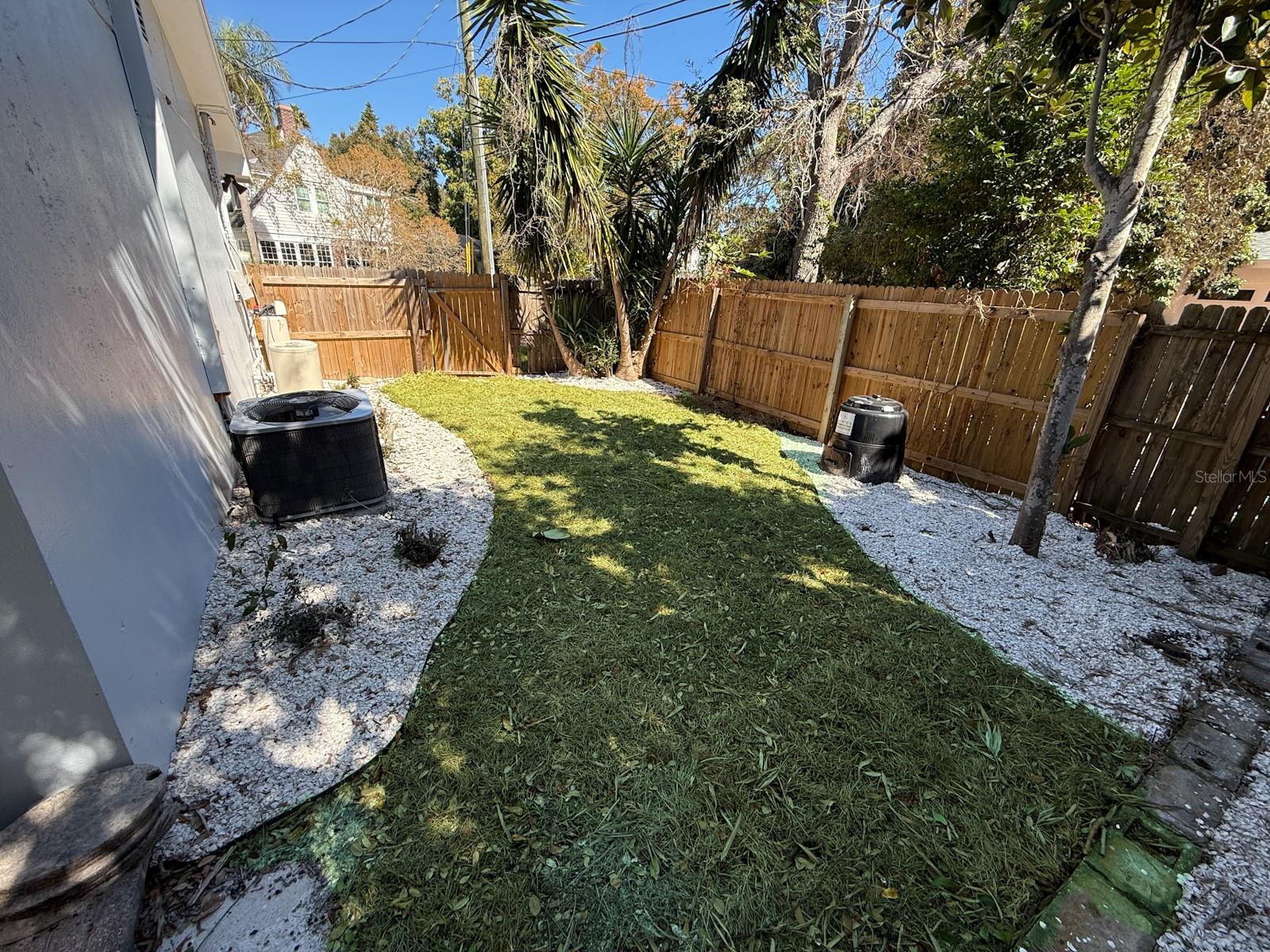fully fenced Side Yard