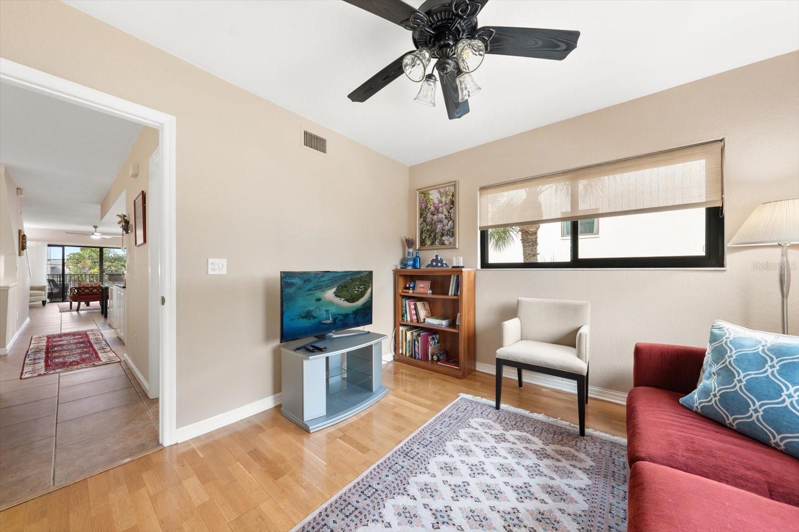 Third bedroom is presently being used as a den. Attractive engineered wood flooring.