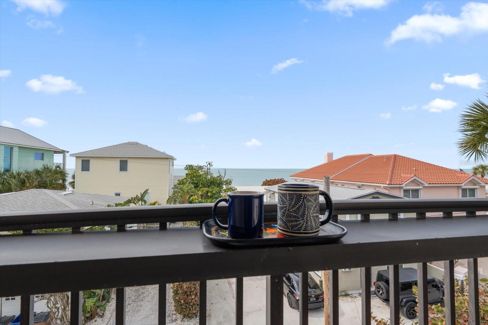 Morning! wake up to cool Gulf breezes and long beach and Gulf views....this lovely residence lives as a single family home without the additional maintenance of one!