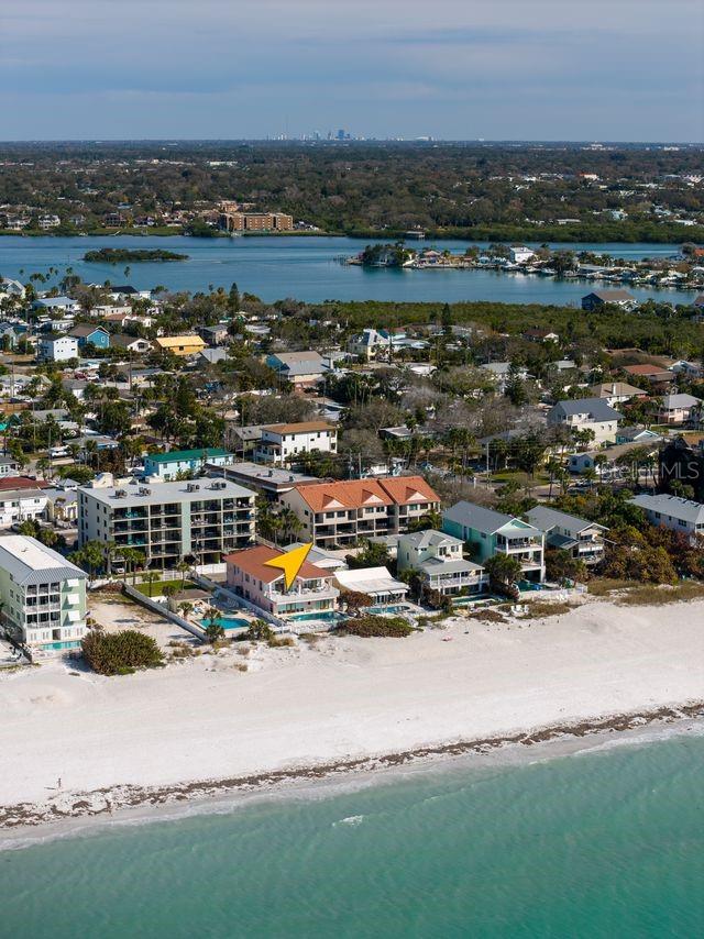 Surrounded by single family luxury beachfront homes, this is a perfect location for affordable living by the shore! No issues with any  storms with this location!