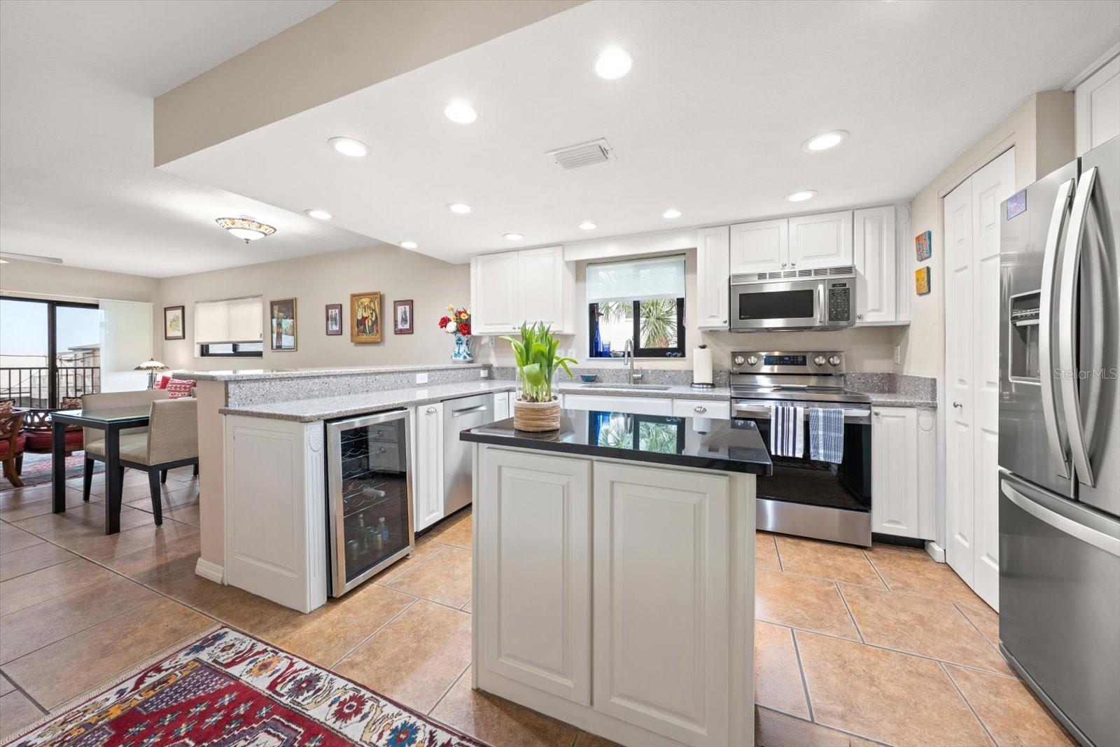 Enticing any chef, the kitchen has the perfect layout for culinary delights!