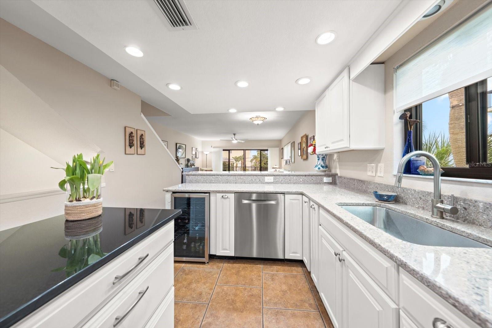 Updated to perfection, the kitchen is the perfect area to enjoy gathering with family or friends- The center island is perfect!