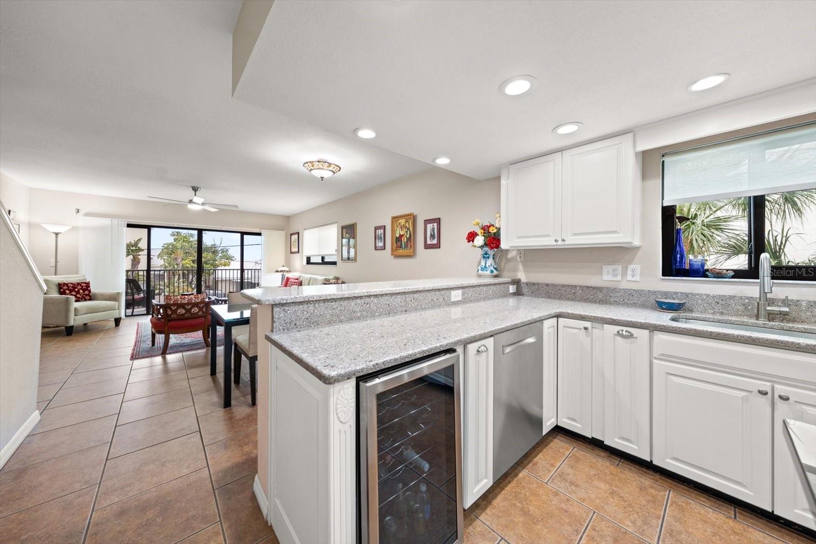 Beverage refrigerator is an additional feature of the fully equipped kitchen. Appliances are less than 5 years old.