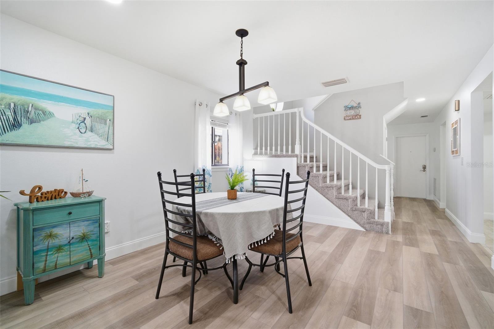 hallway coming from entry and half bath.