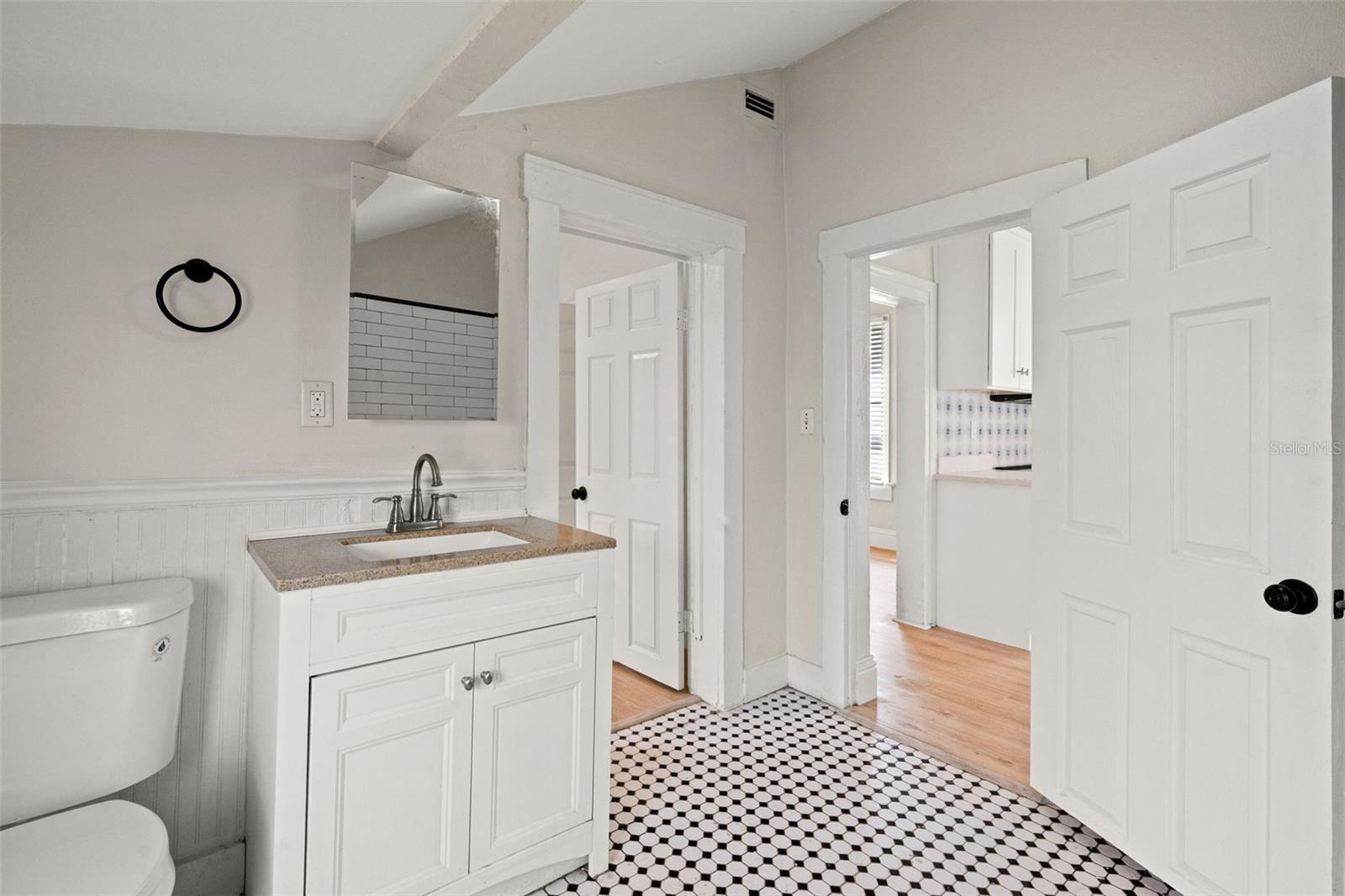 Bathroom (accessible from back bedroom and kitchen)