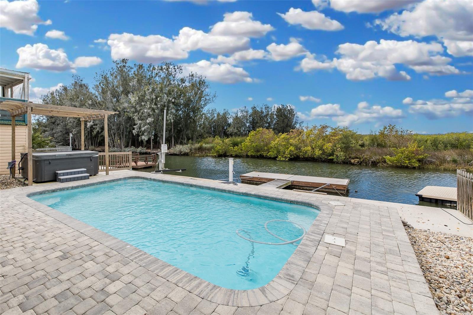 Pool overlooking the canal and dock