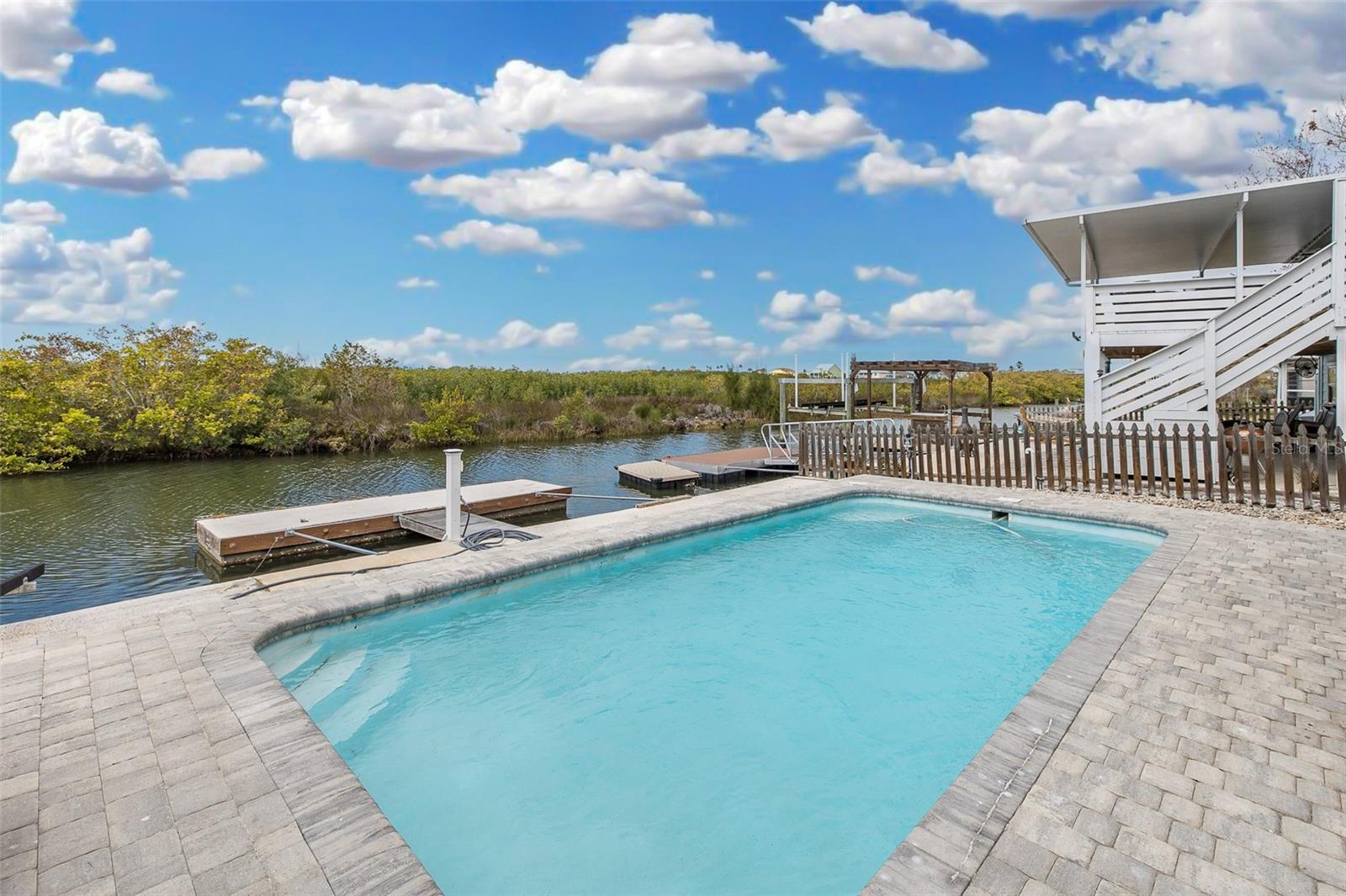 Pool overlooking the canal and dock