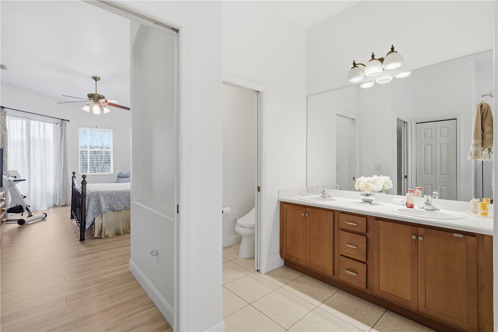 Ensuite primary bathroom, with separate W.C.