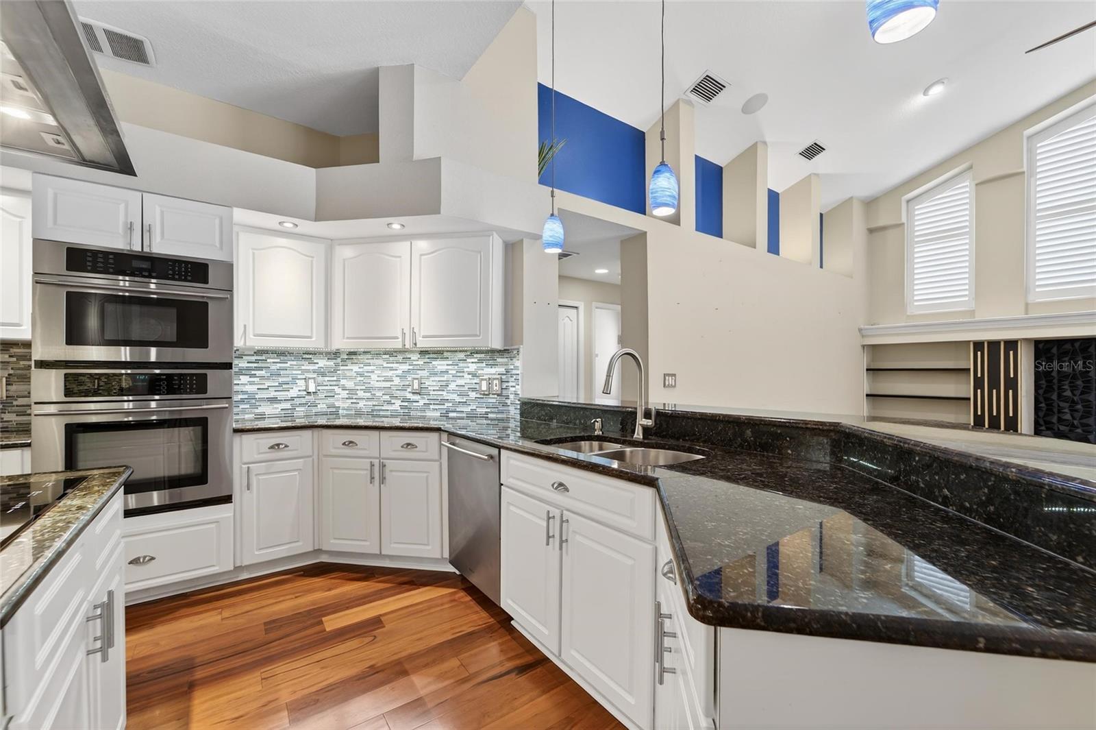 Granite counters and Tile backsplash