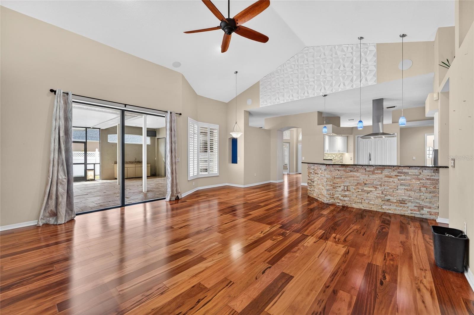 Massive family room with view of the enclosed lanai