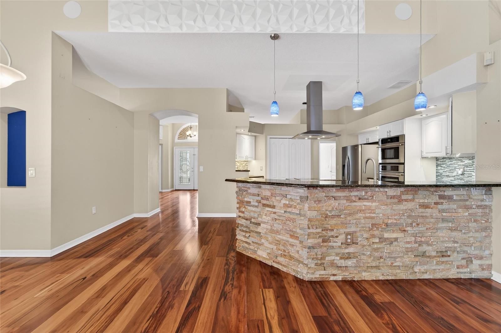 Breakfast bar adorned with Stone kick-wall