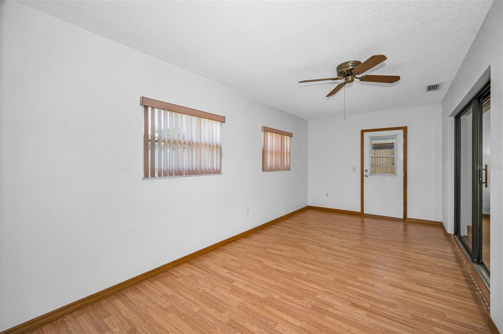 Florida Room! Has exit to exterior and can be closed off from the rest of the house or permanently made into a 3rd bedroom or office. This versatile space offers flexibility for various uses, making it a valuable addition to the property.