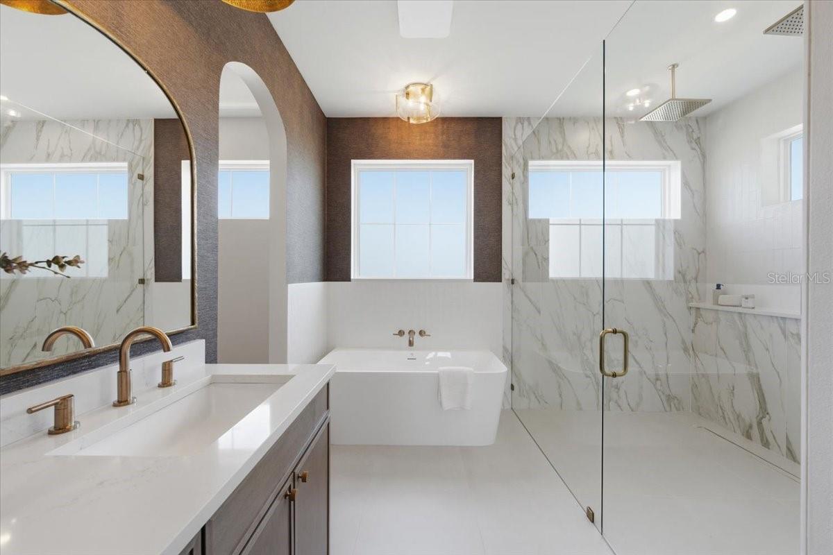 Primary Bathroom with archway into your closet