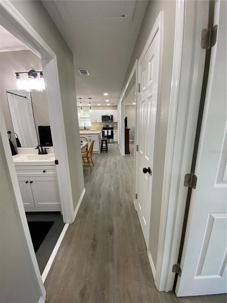 Hallway from bedrooms and bathroom to dining room