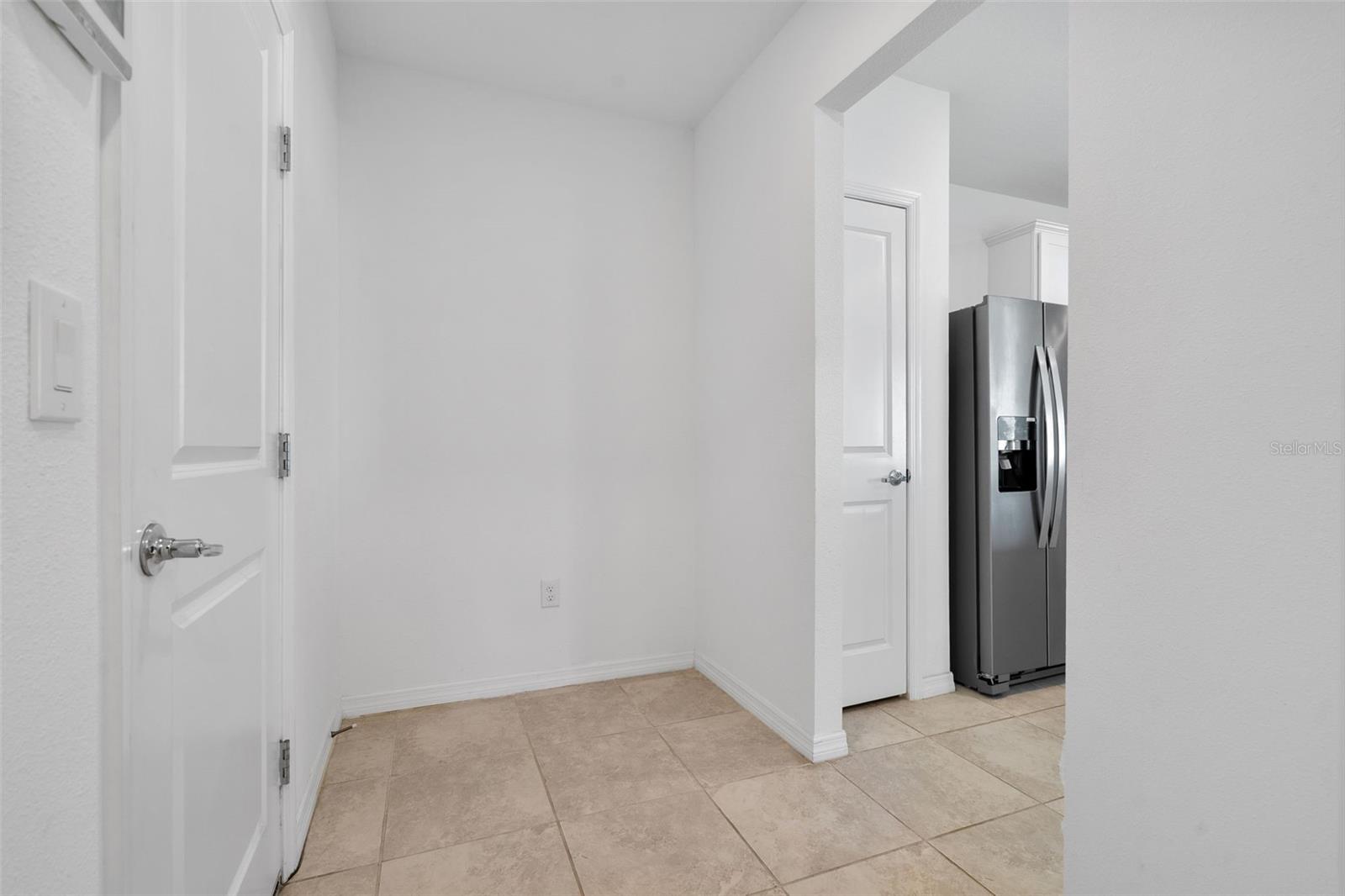 Pantry between kitchen and garage