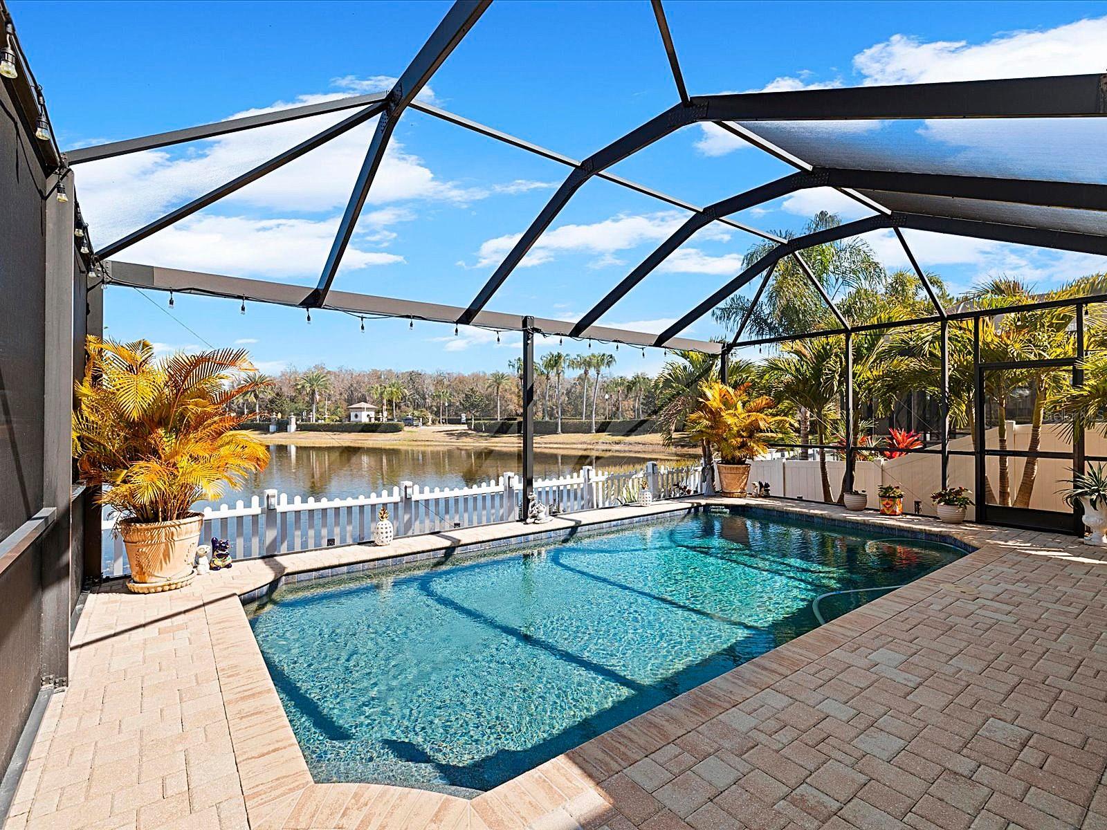 Covered Lanai overlooking pool and pond
