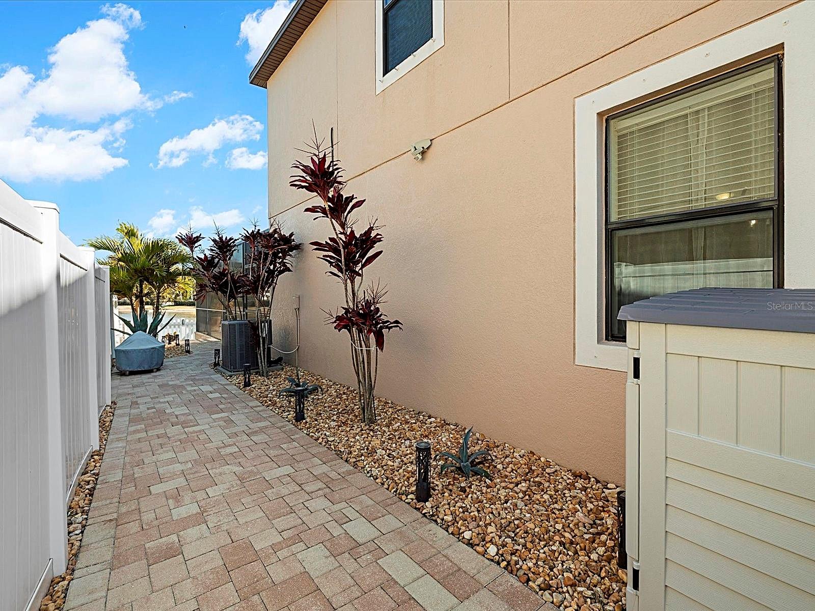 Low-maintenance paved side-yard area