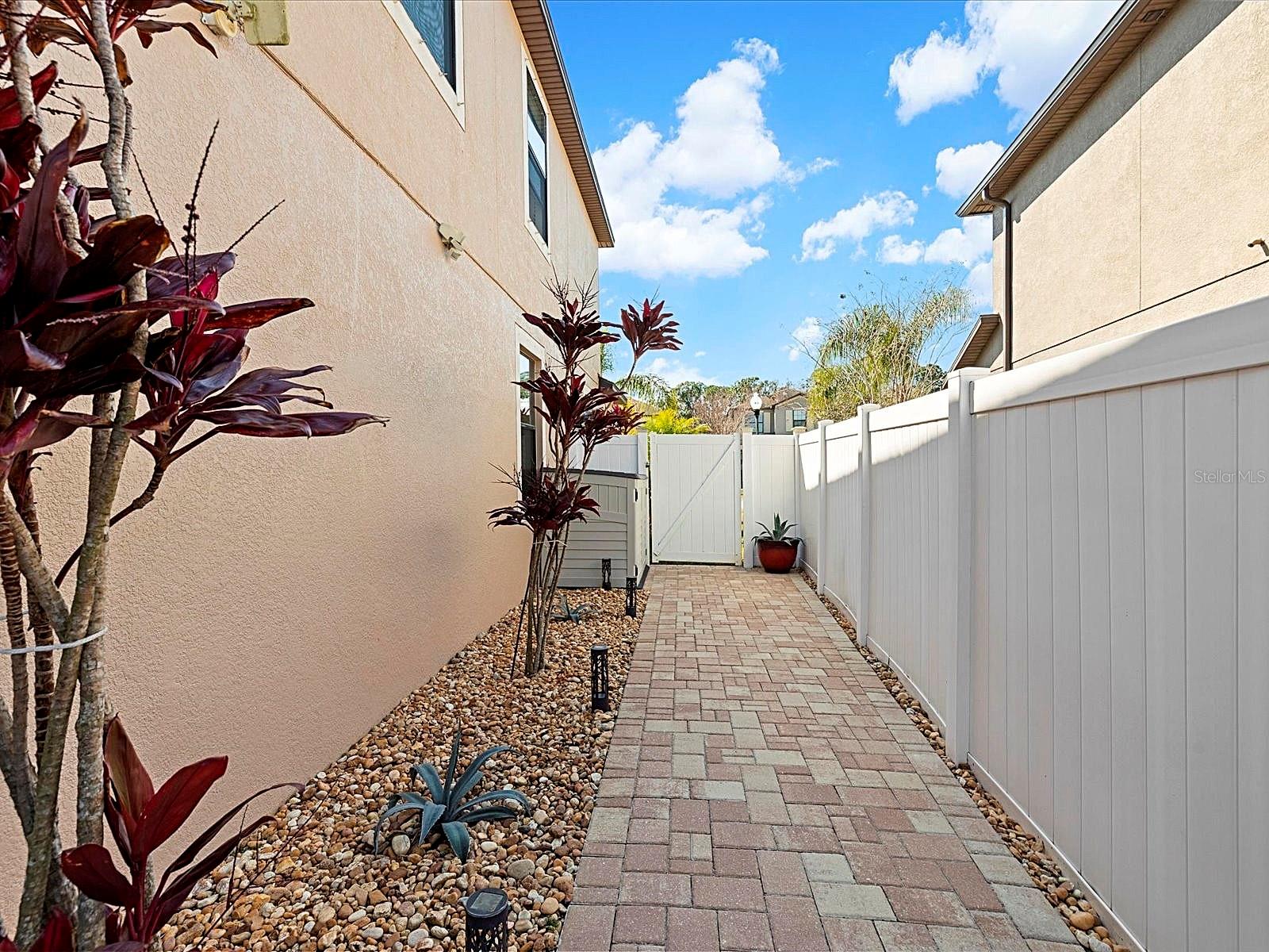 Low-maintenance paved side-yard area