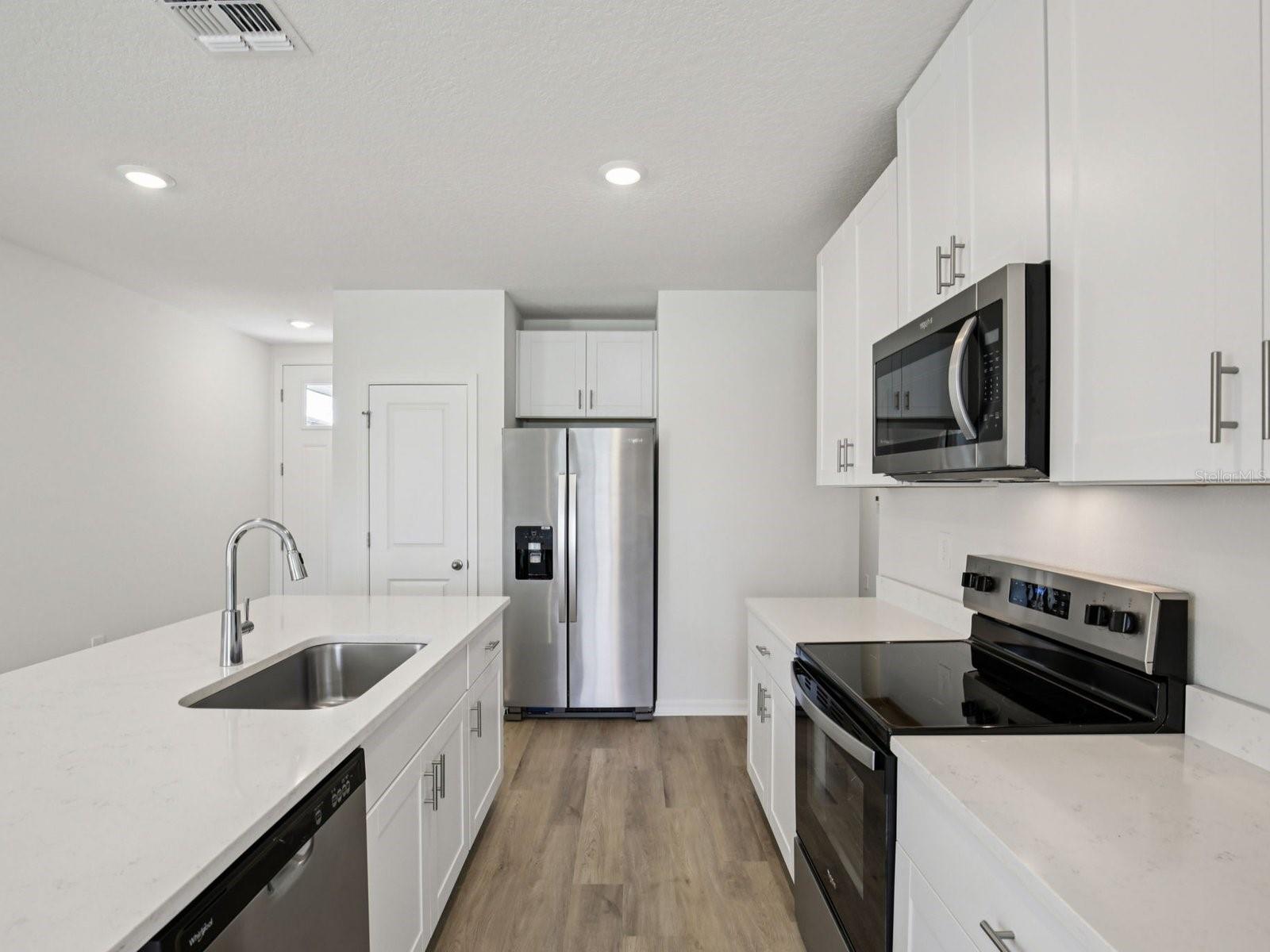 Interior photos are not of the actual home but are photos of the builder home with the same floorplan with similar interior finishes and features.