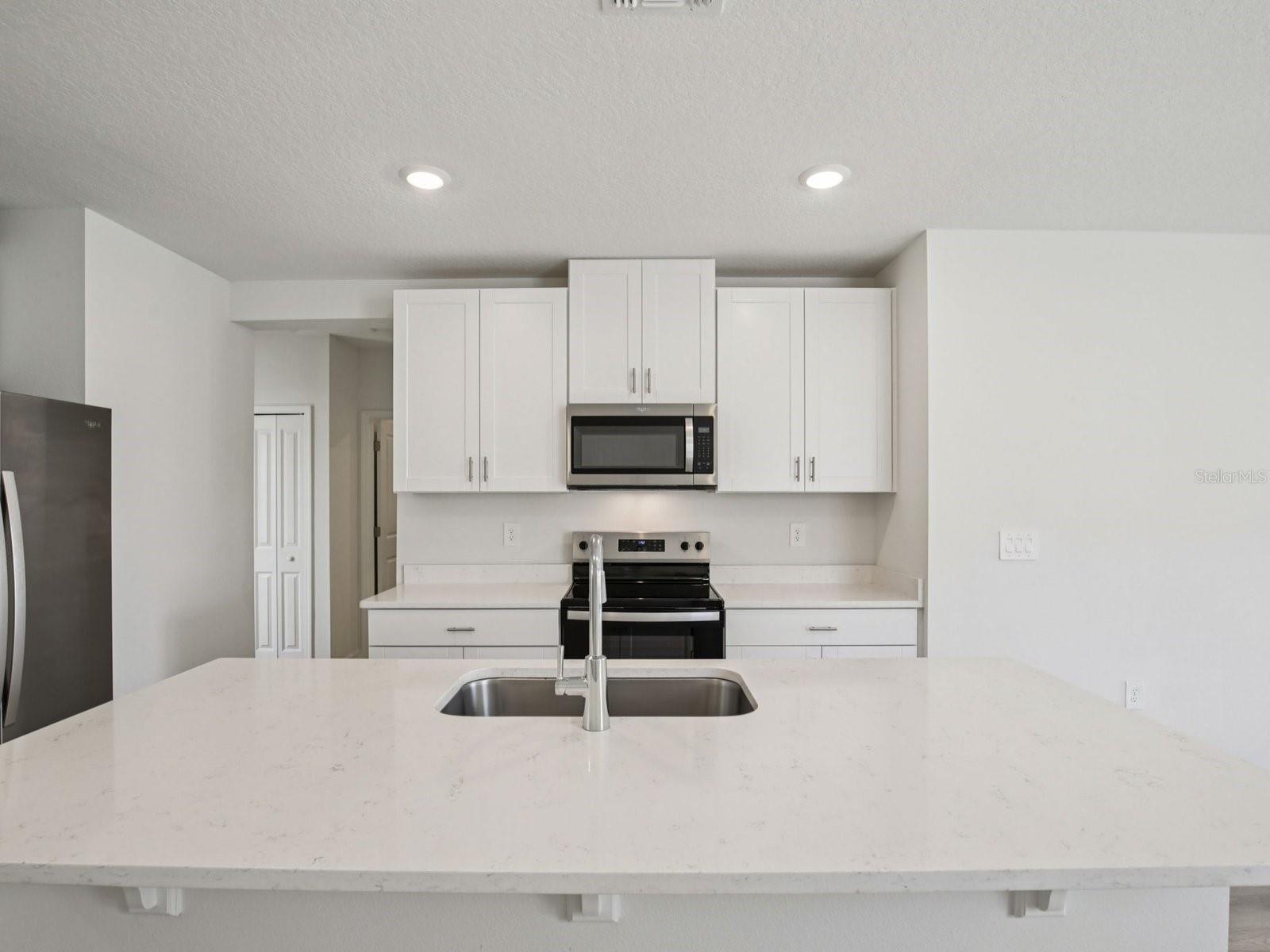 Interior photos are not of the actual home but are photos of the builder home with the same floorplan with similar interior finishes and features.