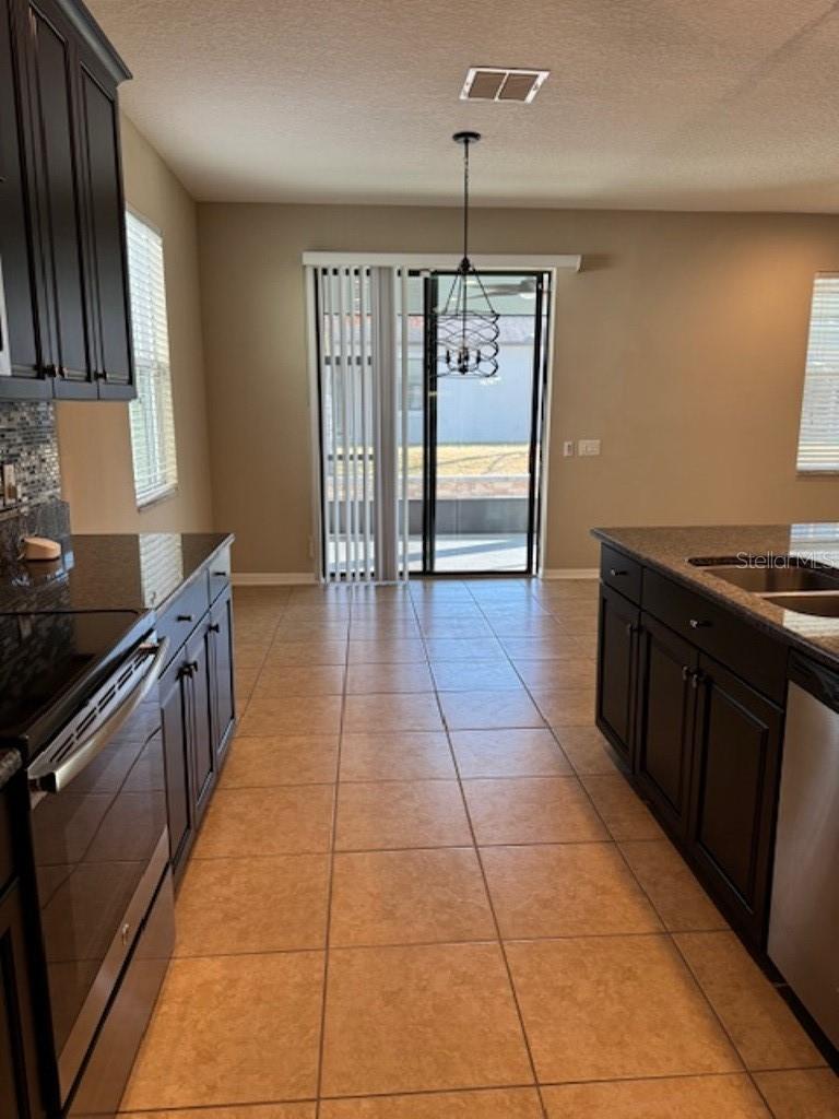 Kitchen looking towards dinette area and lanai