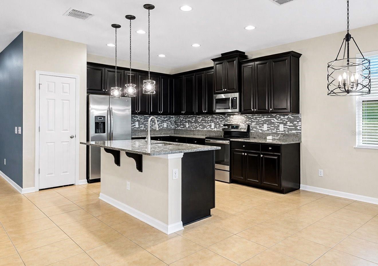 Updated lighting in dinette and kitchen