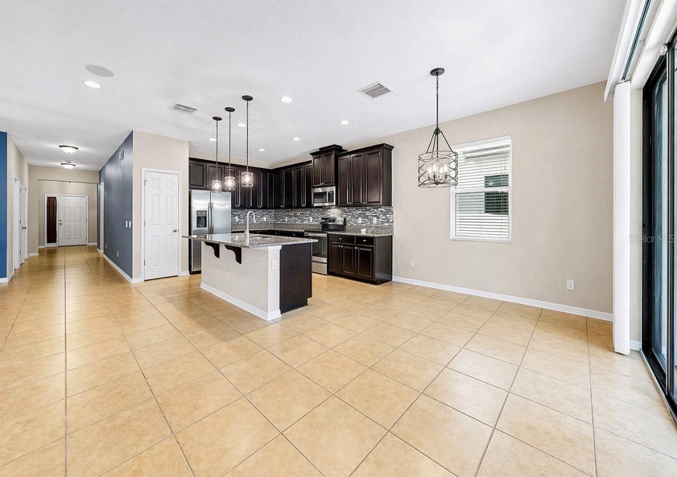 Another view showing entrance to house kitchen and dinette area